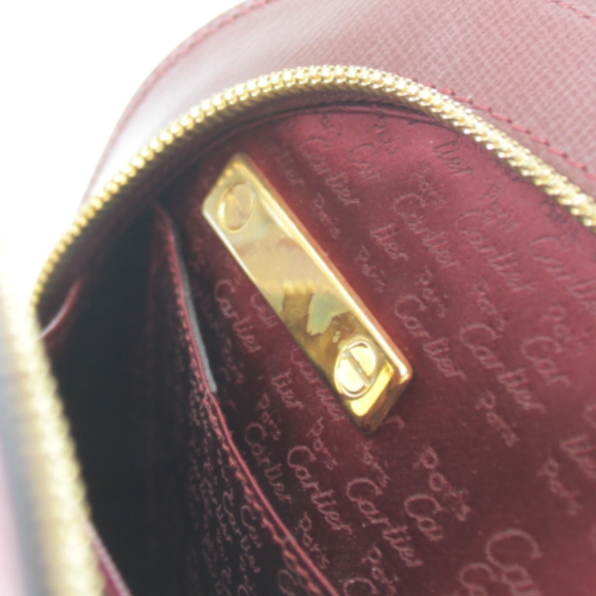 Cartier Must Wine Red Leather Handbag (Pre-Owned)