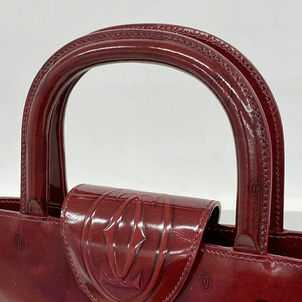 Cartier Bordeaux Patent Leather Handbag (Pre-Owned)