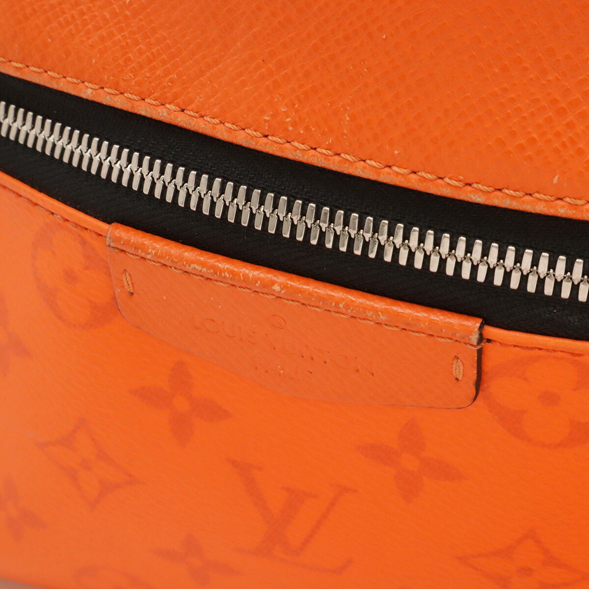 Louis Vuitton Monogram Eclipse Orange Taigarama Backpack (Pre-Owned)