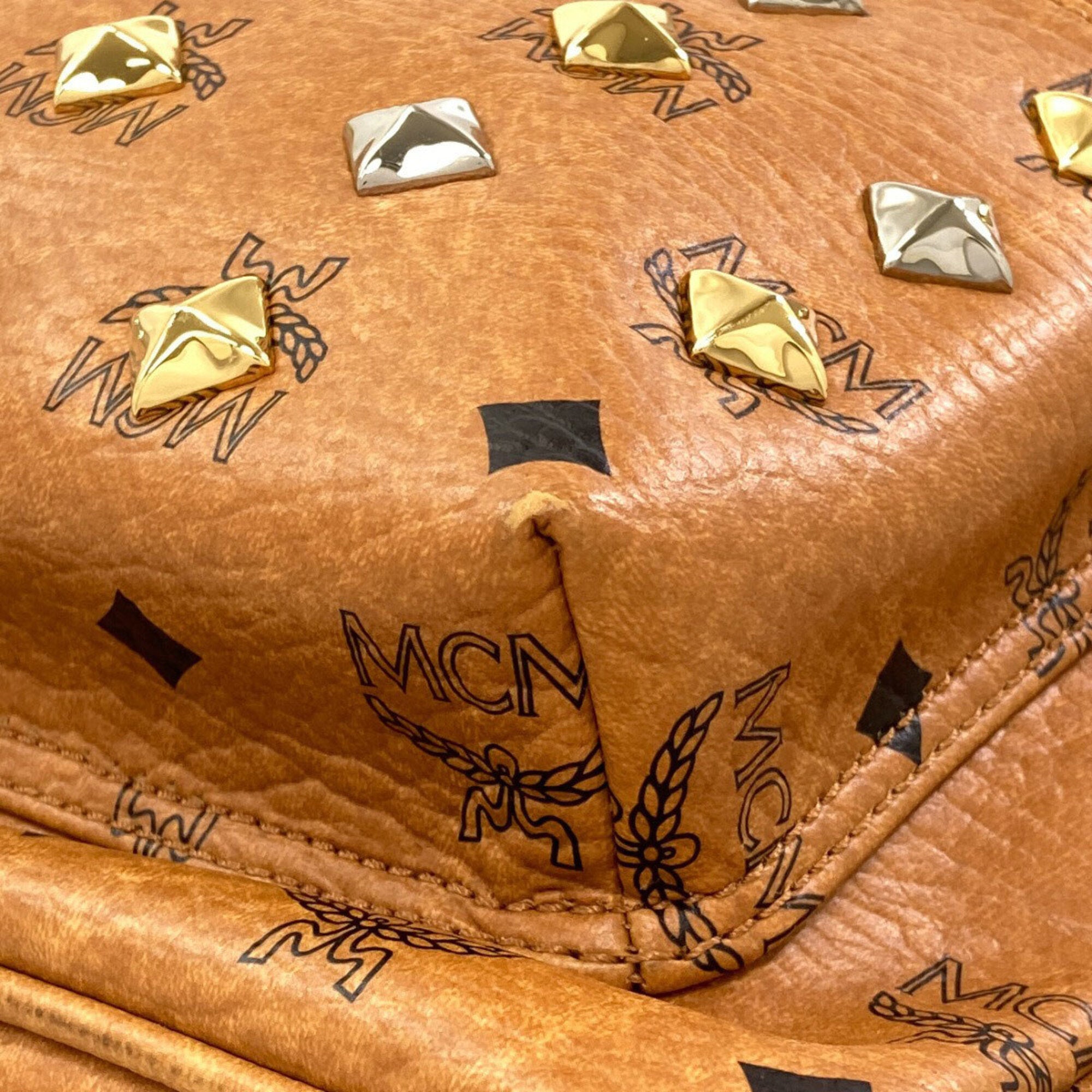 Mcm Brown Pvc Backpack (Pre-Owned)
