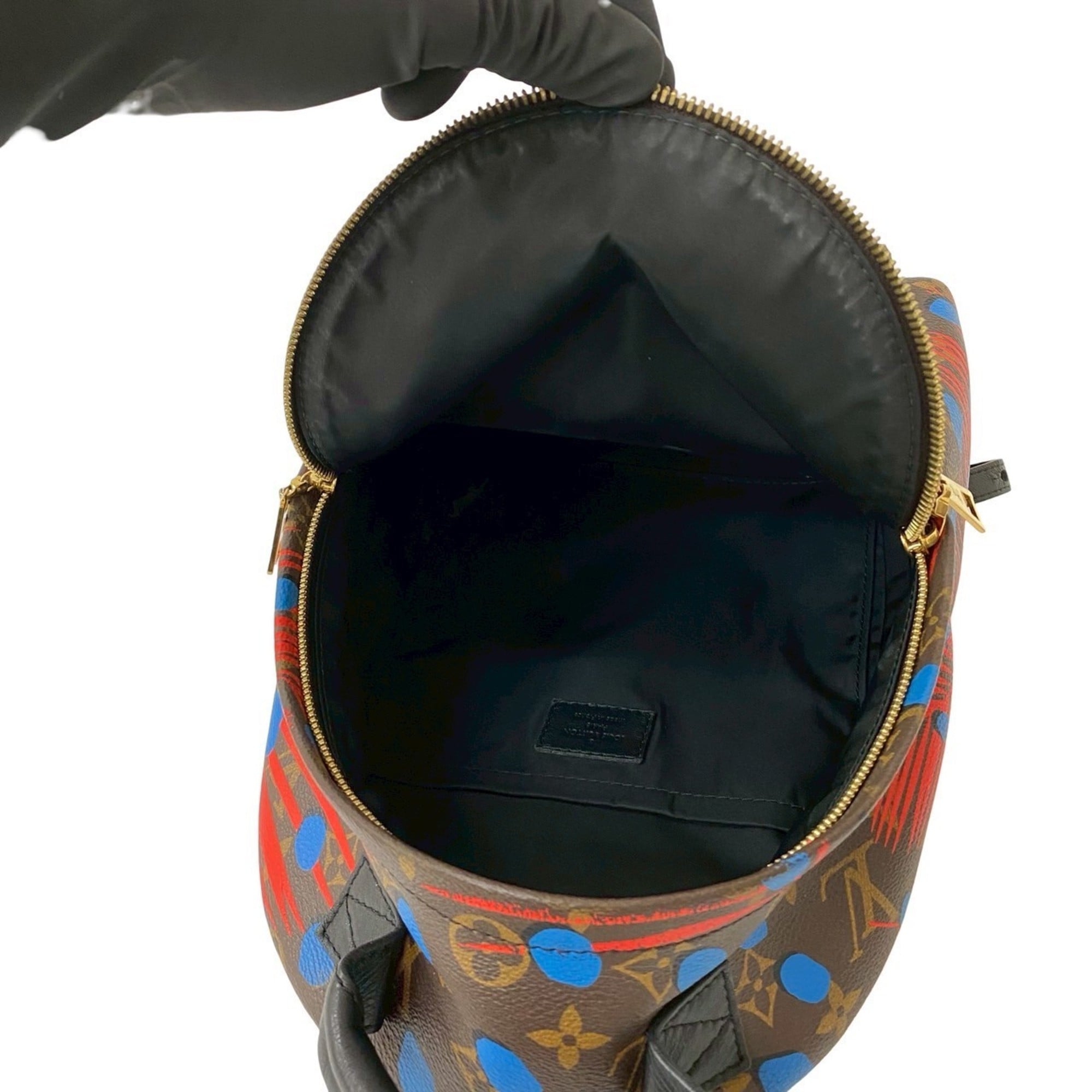 Louis Vuitton Blue Brown Red Color Leather Pvc Backpack (Pre-Owned)