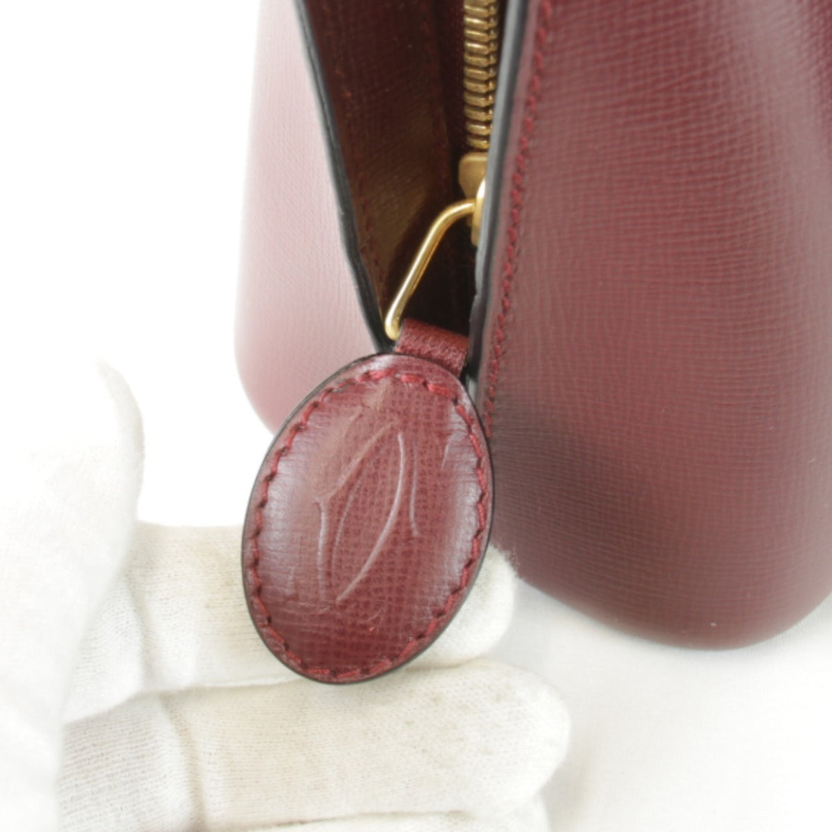 Cartier Must Wine Red Leather Handbag (Pre-Owned)