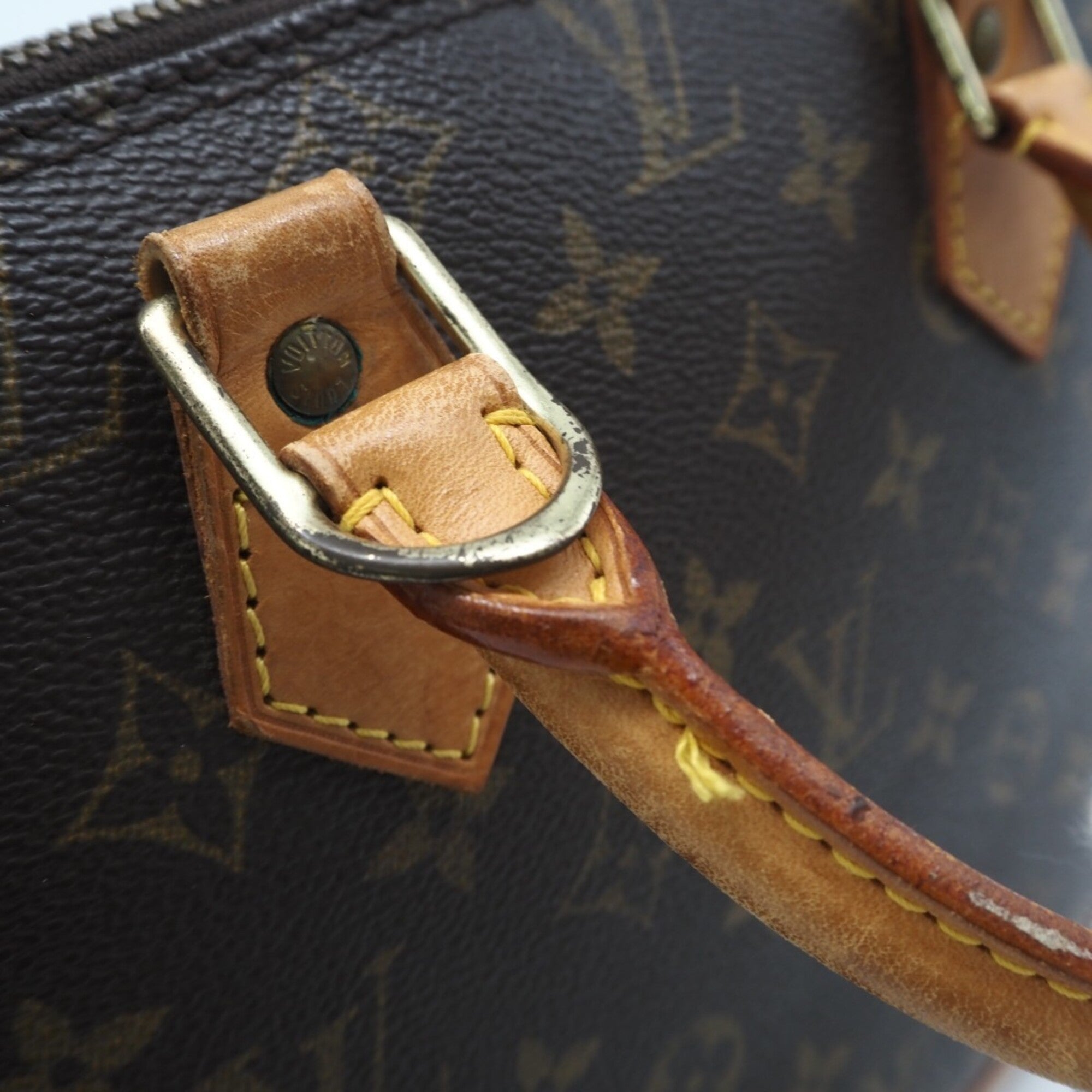 Louis Vuitton Brown Coated Canvas Leather Handbag (Pre-Owned)