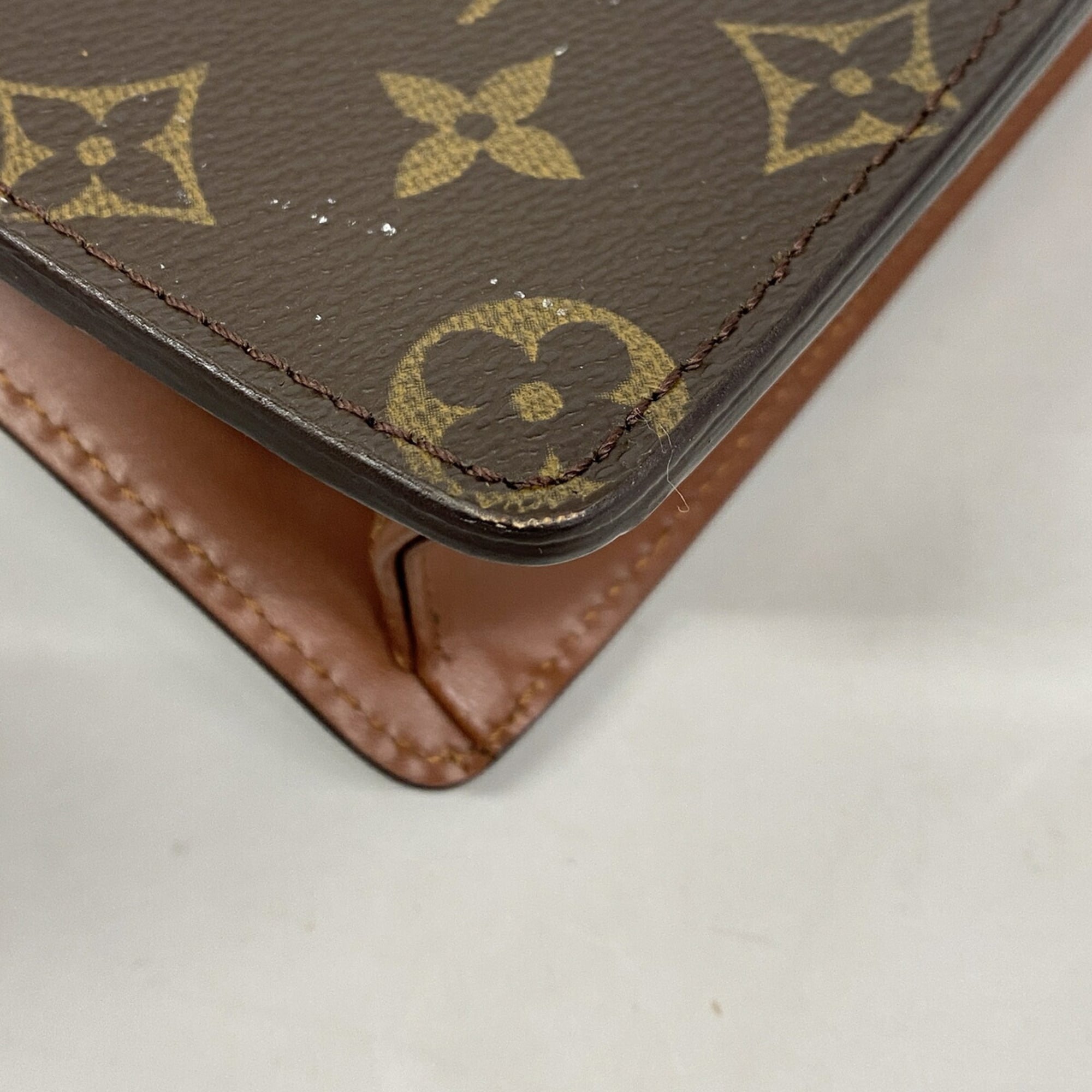 Louis Vuitton Brown Clutch Bag (Pre-Owned)