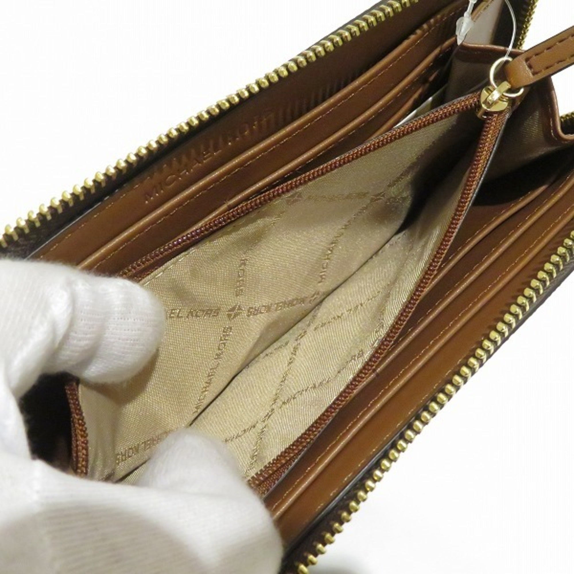 Michael Kors Brown Pvc Leather Long Wallet (Bi-Fold) (Pre-Owned)