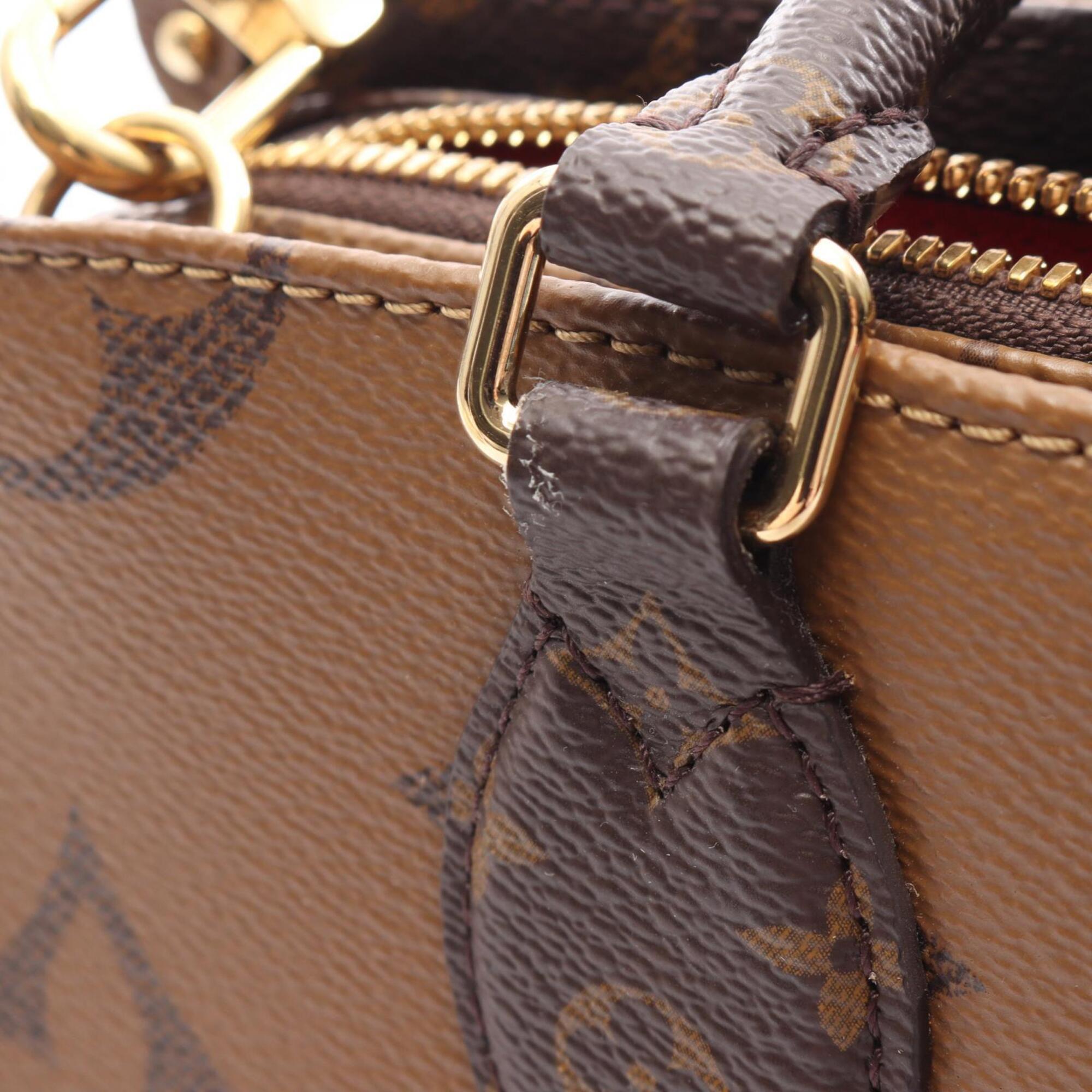 Louis Vuitton Brown Coated Canvas Handbag Pouch (Pre-Owned)