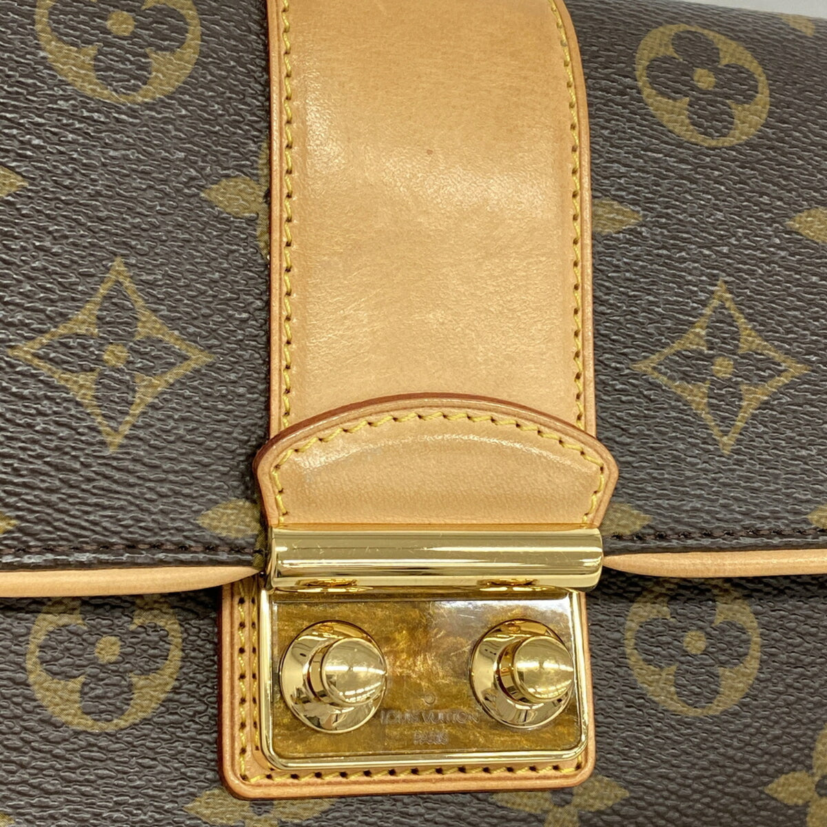 Louis Vuitton Brown Clutch Bag (Pre-Owned)