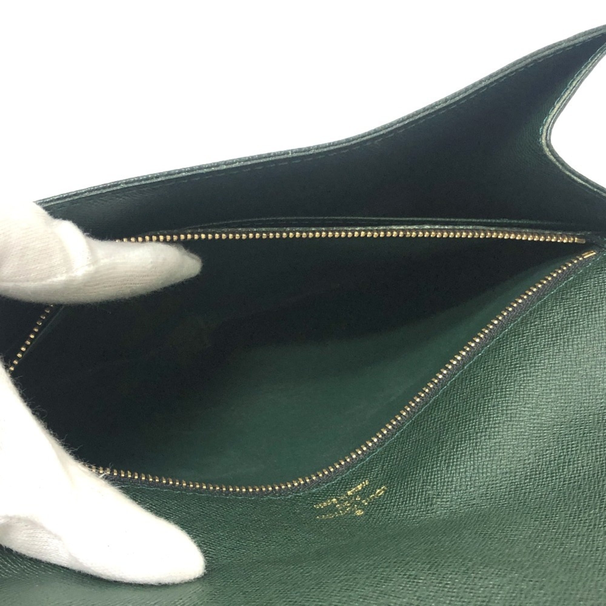 Louis Vuitton Episea Leather Taiga Leather Clutch Bag (Pre-Owned)