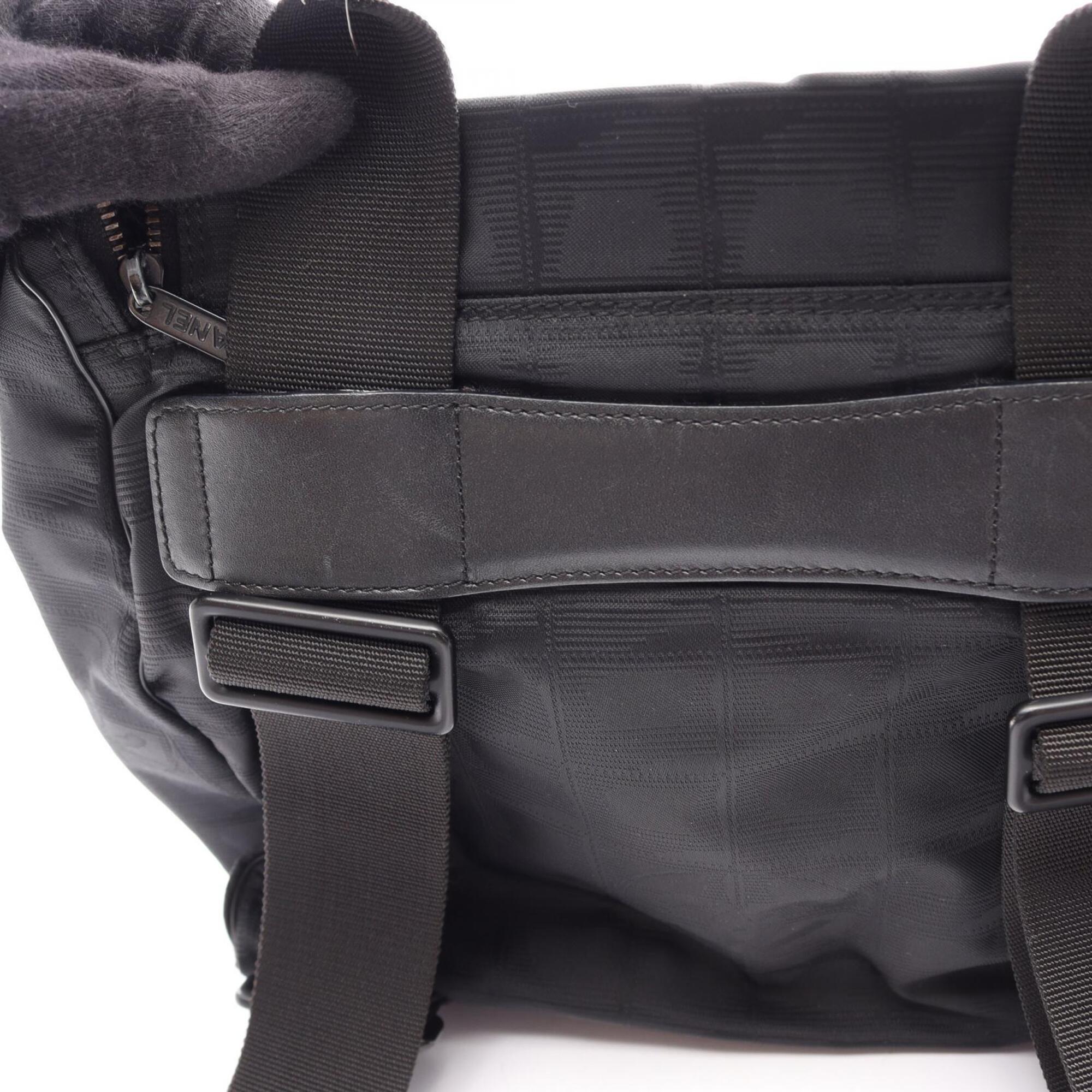 Chanel Black Leather Nylon Canvas Backpack Handbag (Pre-Owned)