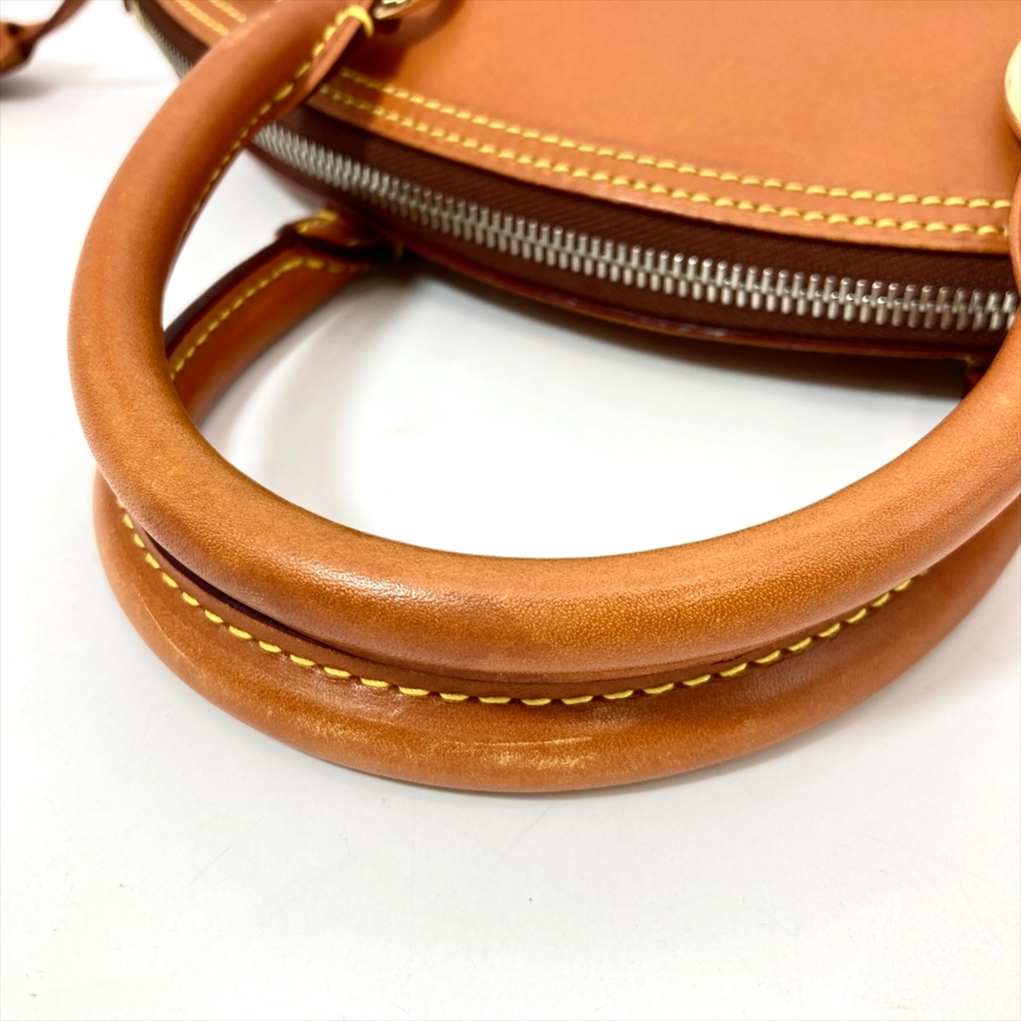 Louis Vuitton Camel Nomade Leather Handbag (Pre-Owned)