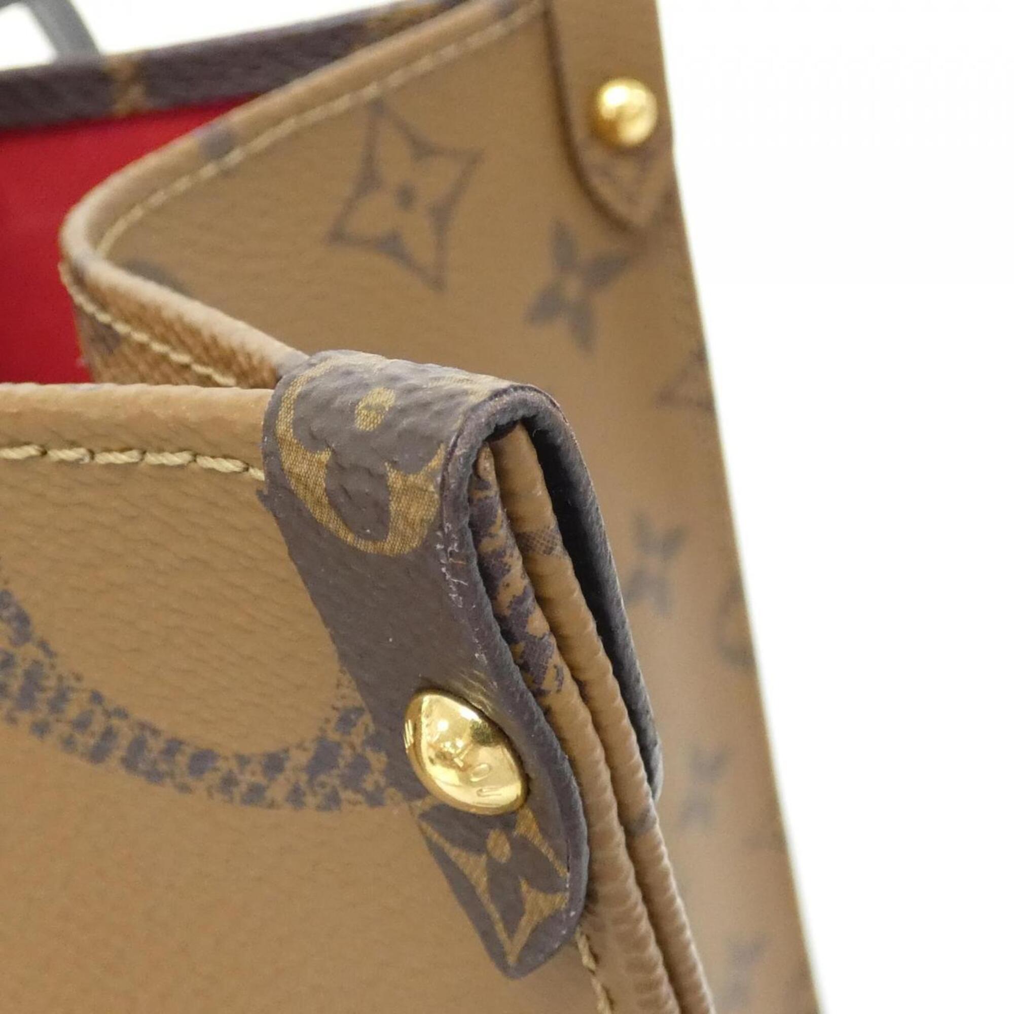 Louis Vuitton Brown Coated Canvas Handbag (Pre-Owned)