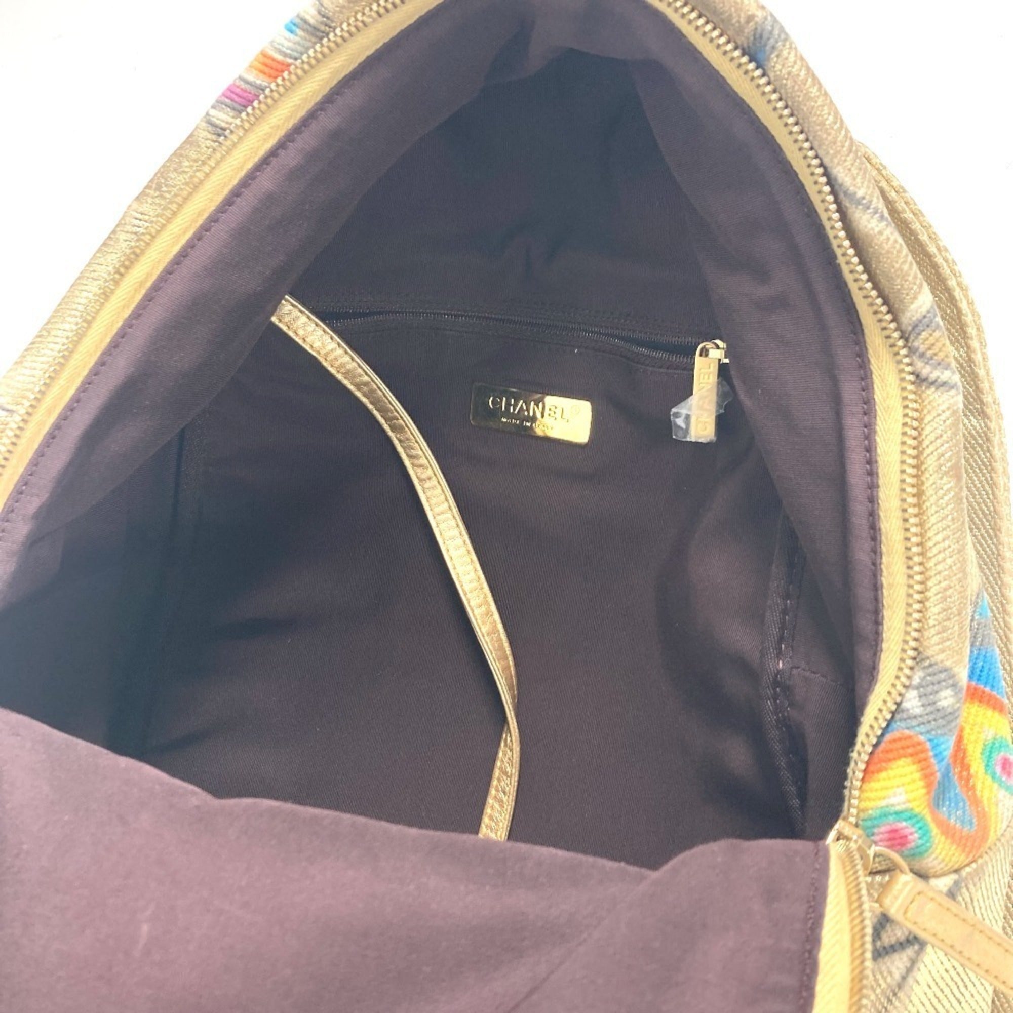 Chanel Gold Leather Canvas Backpack (Pre-Owned)