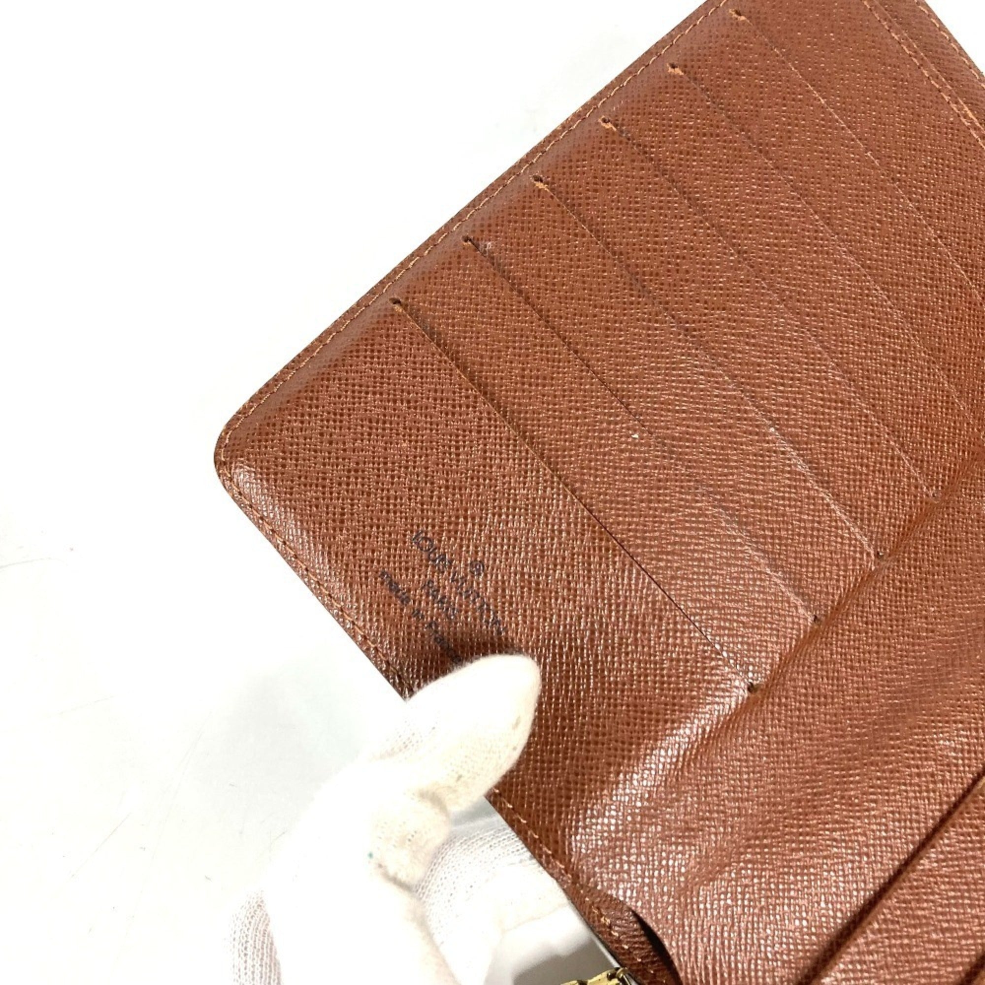 Louis Vuitton Brown Monogram Canvas Wallet (Bi-Fold) (Pre-Owned)