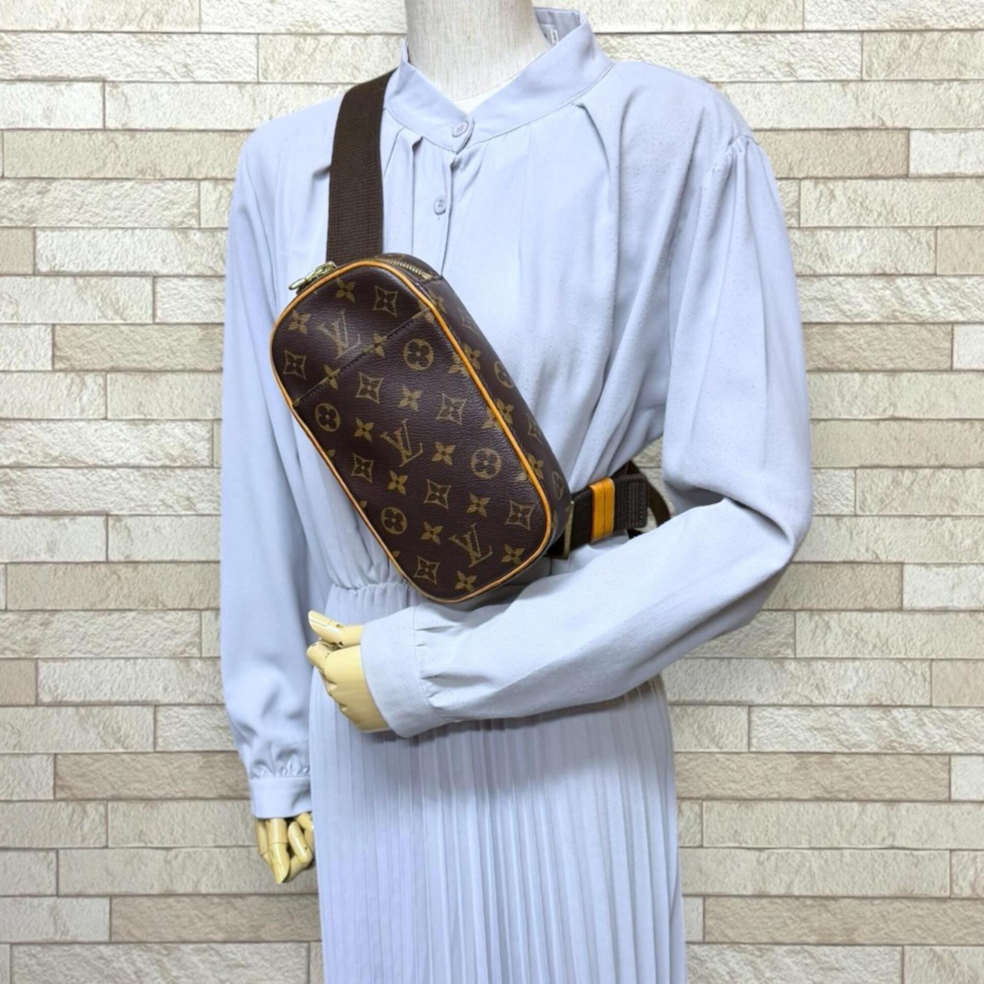 Louis Vuitton Brown Monogram Canvas Backpack (Pre-Owned)