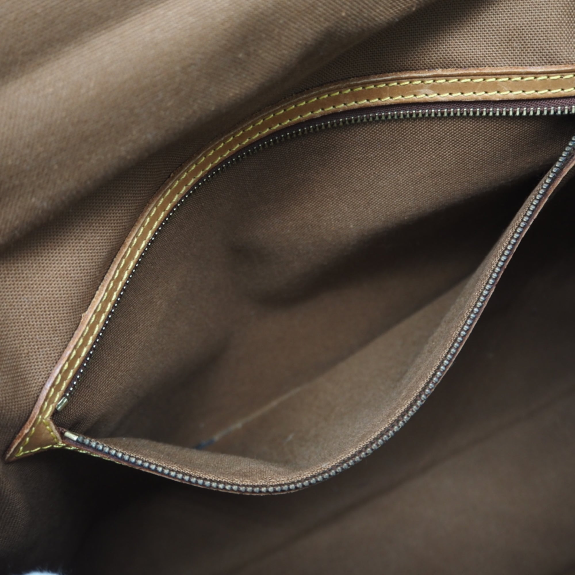 Louis Vuitton Brown Coated Canvas Leather Handbag (Pre-Owned)