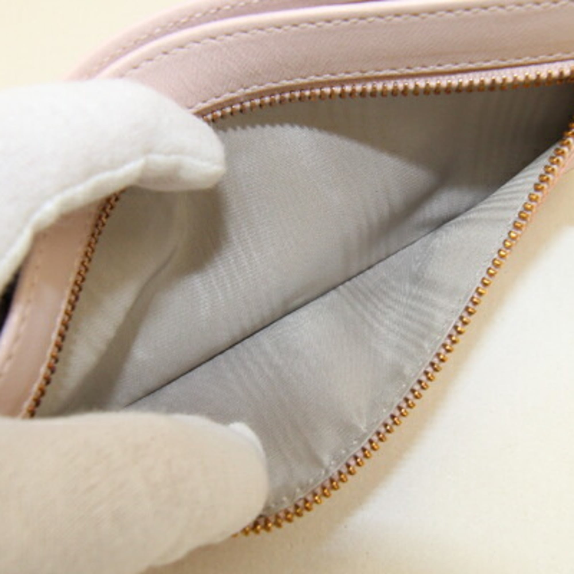 Tod's Light Pink Leather Clutch Bag (Pre-Owned)