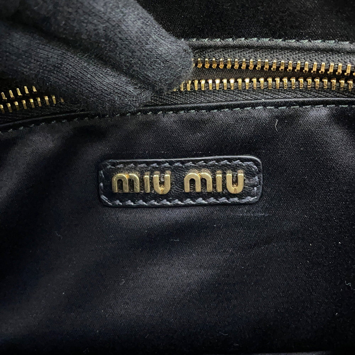 Miu Miu Matelasse Black Leather Clutch Bag Handbag (Pre-Owned)