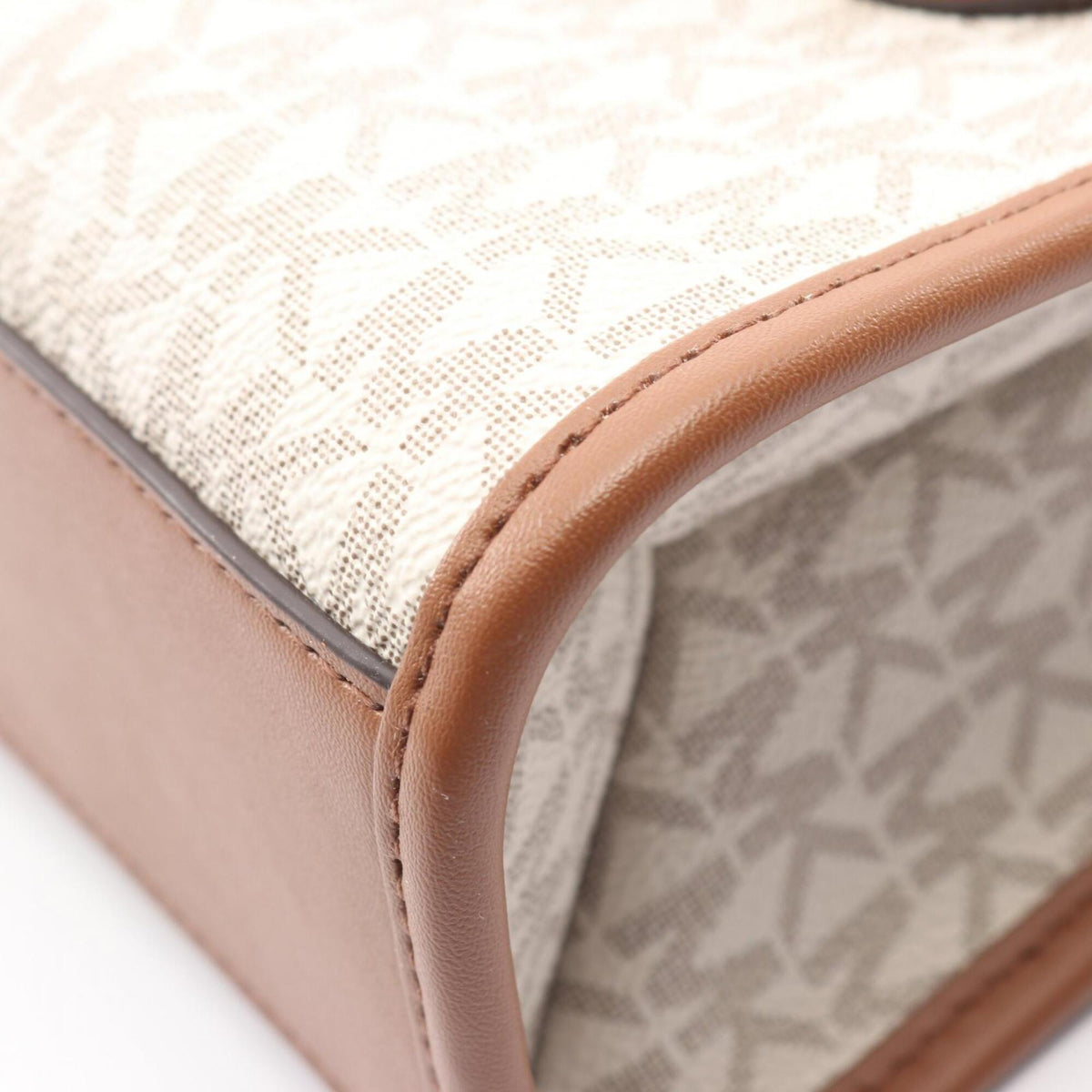 Michael Kors Brown White Leather Pvc Coated Canvas Handbag (Pre-Owned)