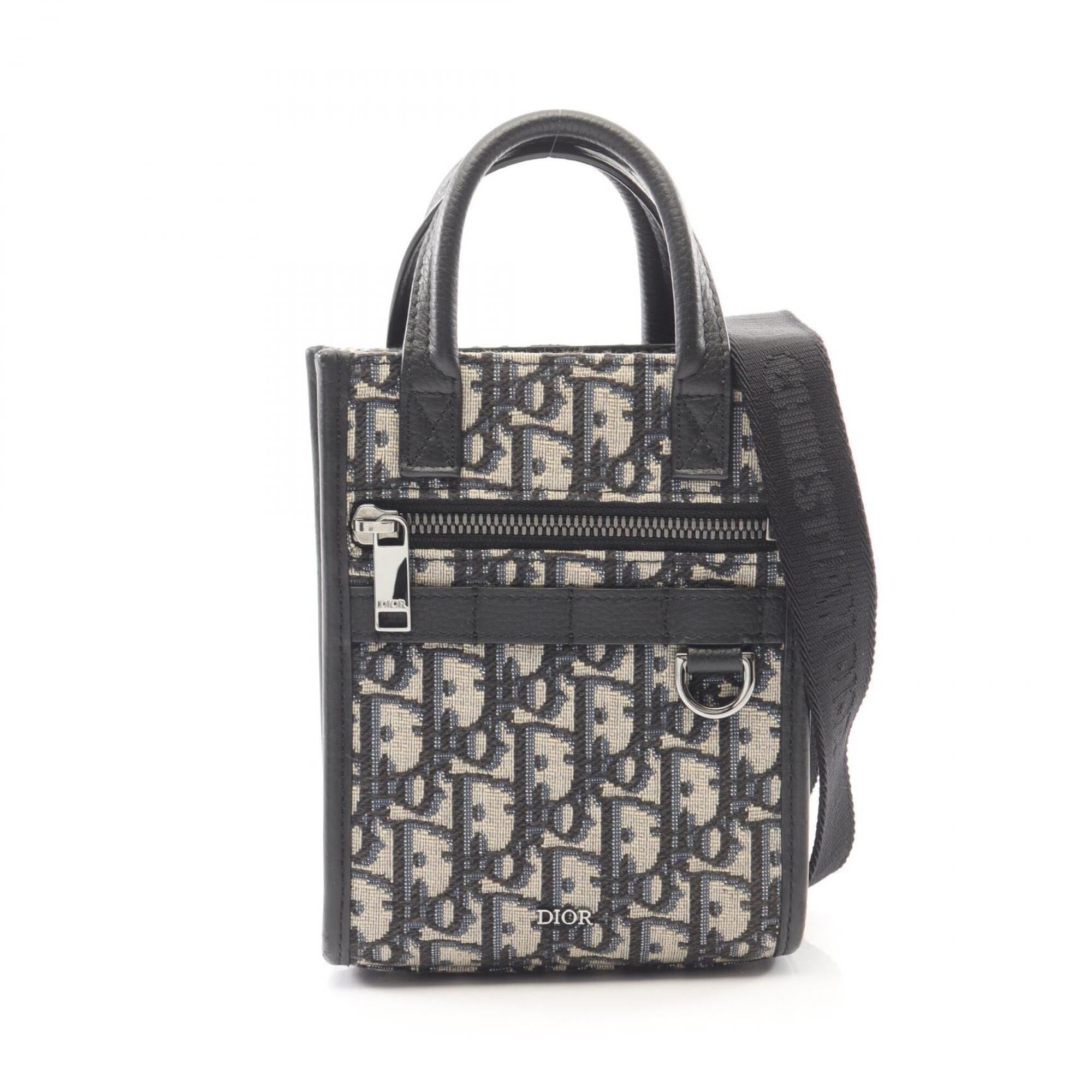 Christian Dior Beige Black Canvas Leather Handbag (Pre-Owned)