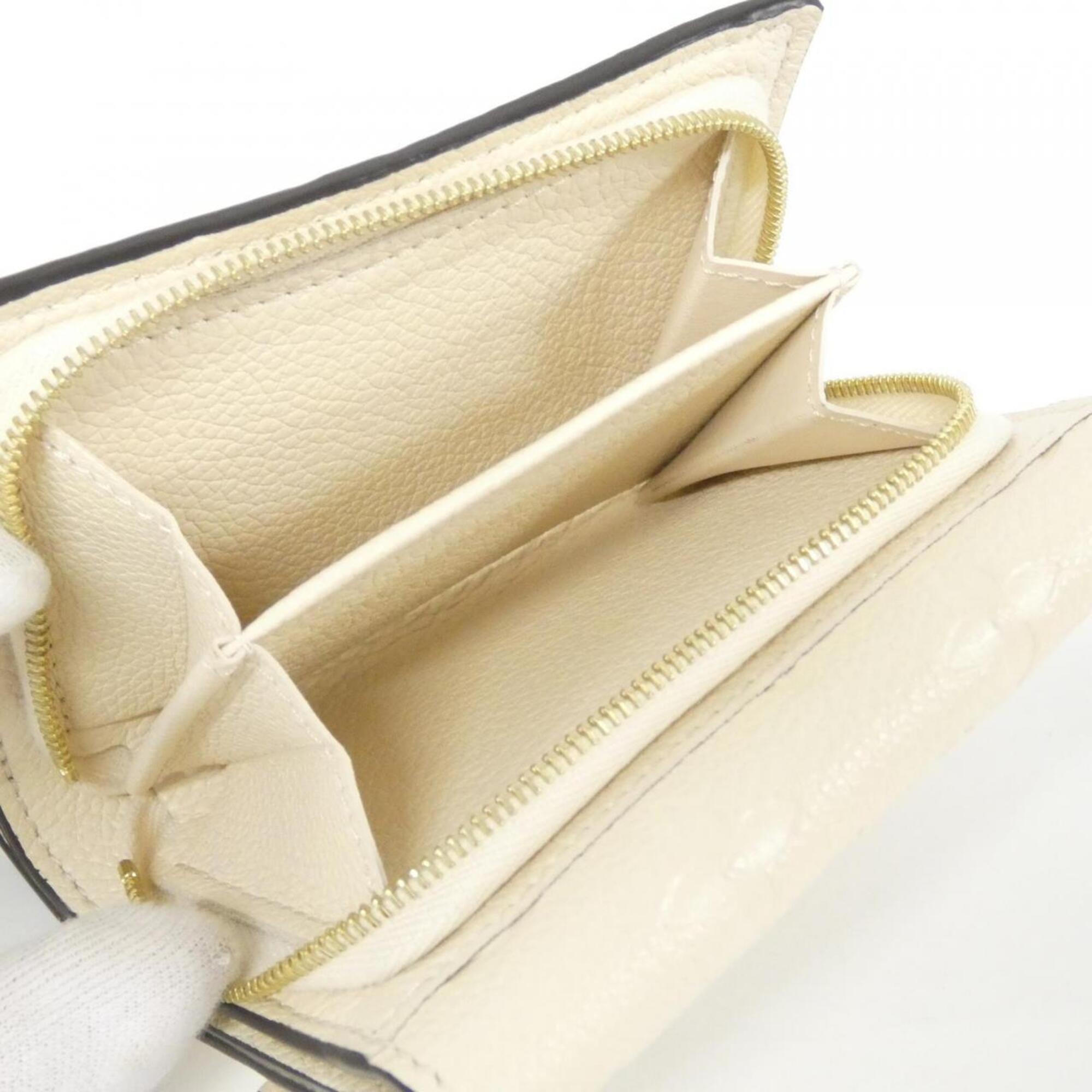Louis Vuitton Monogram Empreinte Leather Wallet (Tri-Fold) (Pre-Owned)