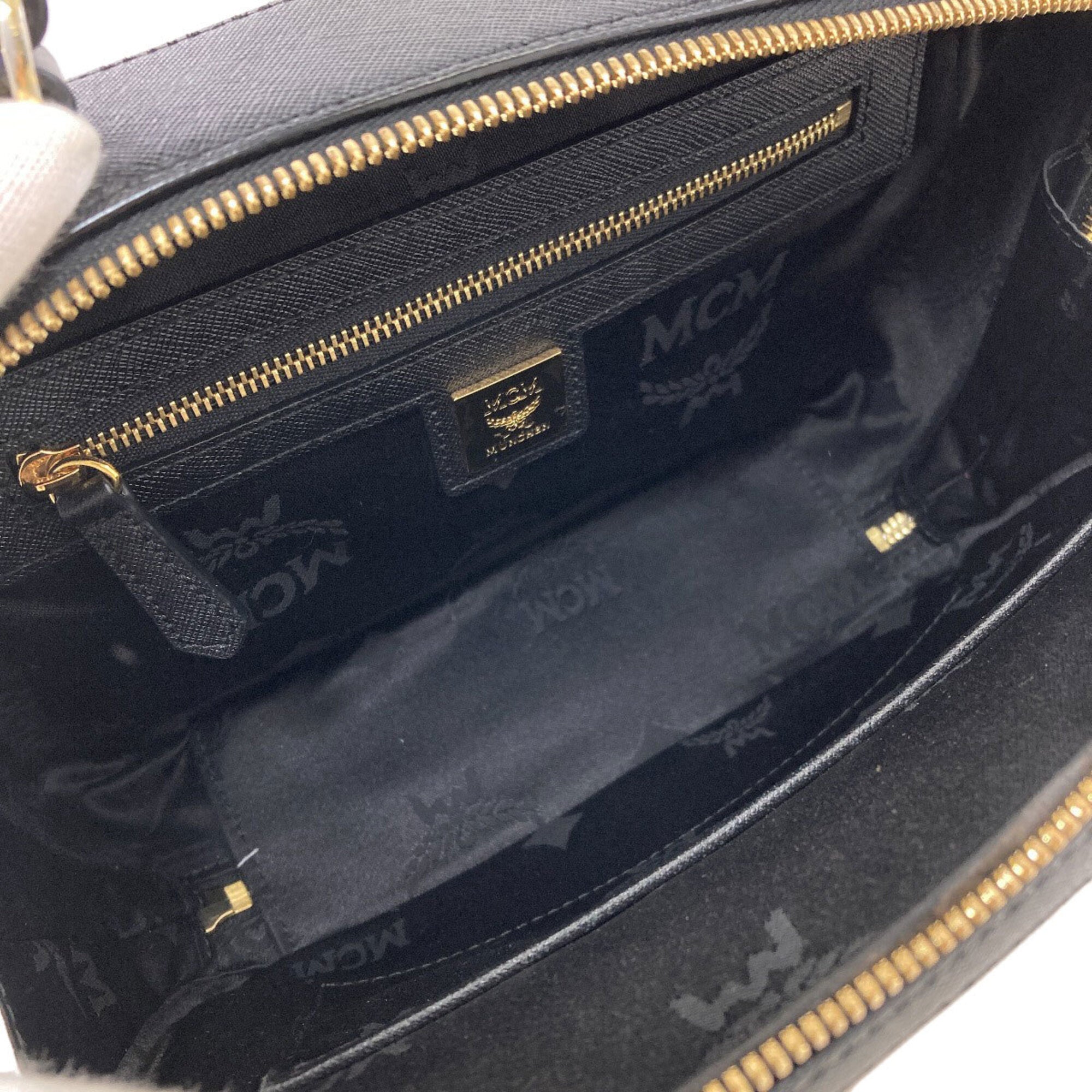 Mcm Black Brown White Pvc Handbag (Pre-Owned)