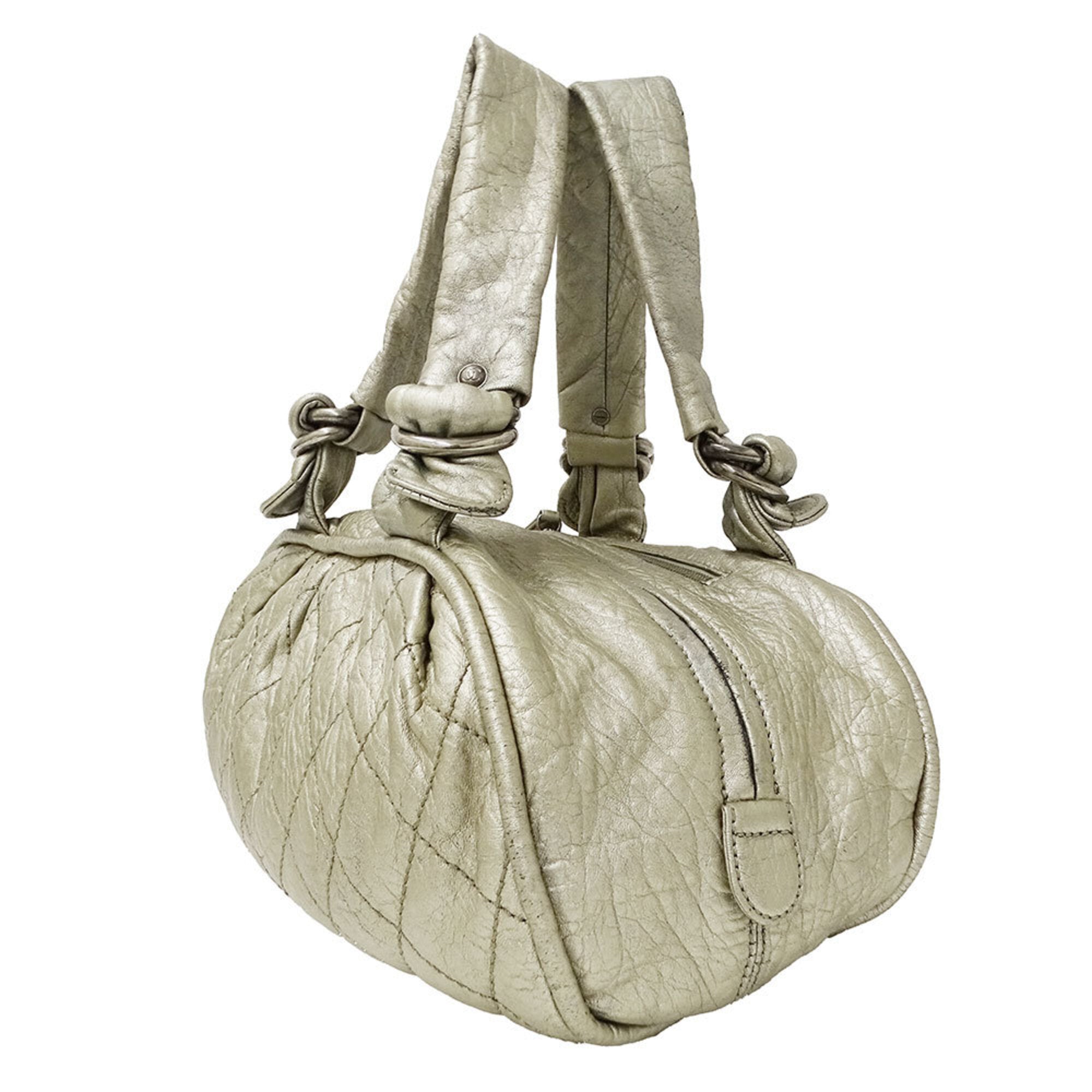 Chanel Champagne Gold Leather Handbag (Pre-Owned)