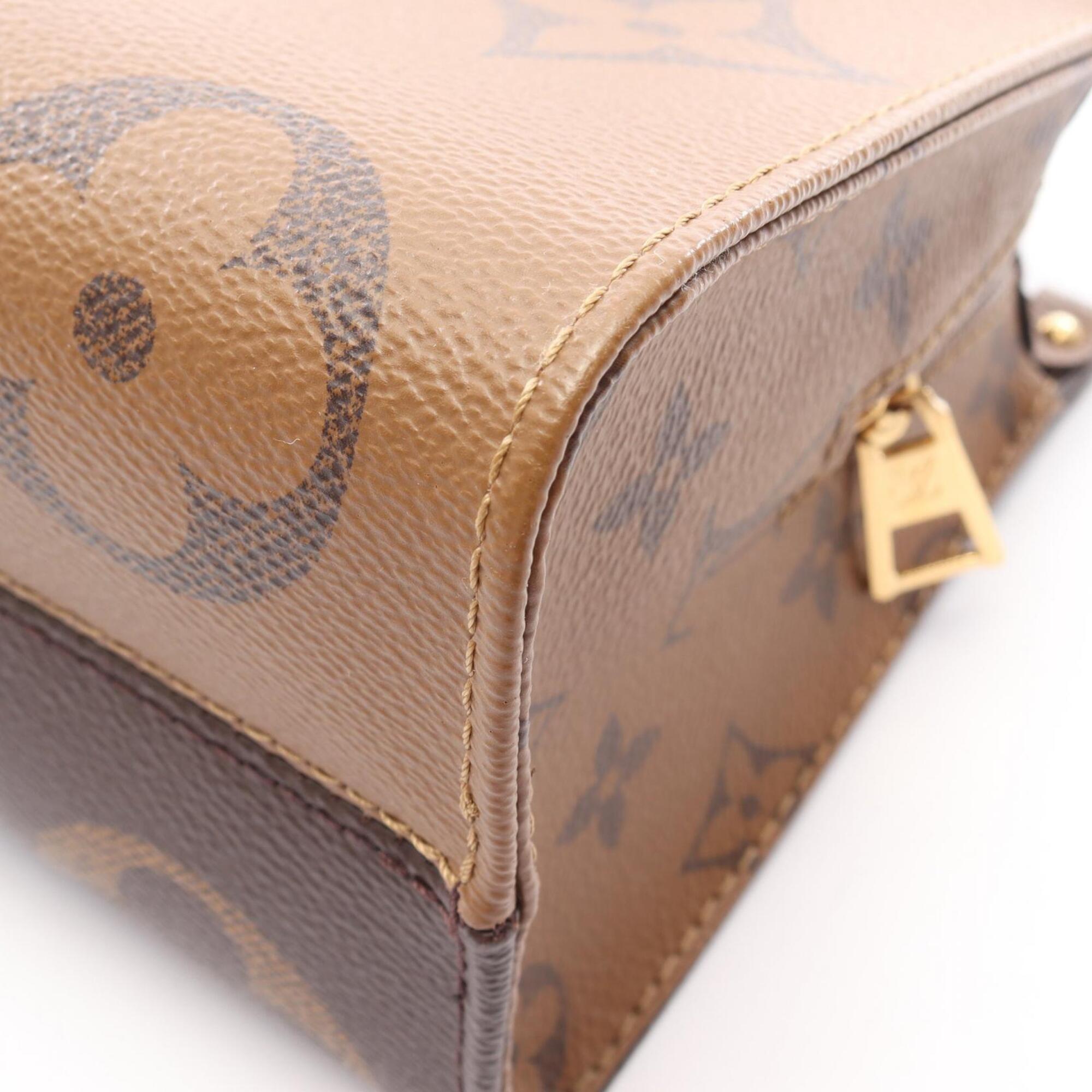 Louis Vuitton Brown Coated Canvas Handbag Pouch (Pre-Owned)
