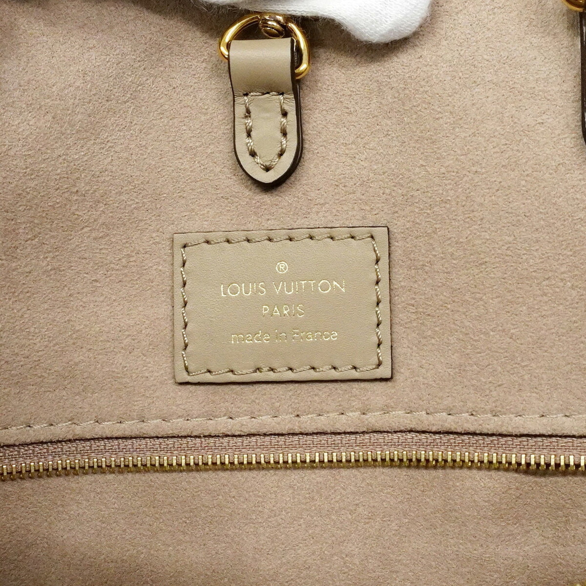 Louis Vuitton Cream Tourterelle Tote Bag (Pre-Owned)
