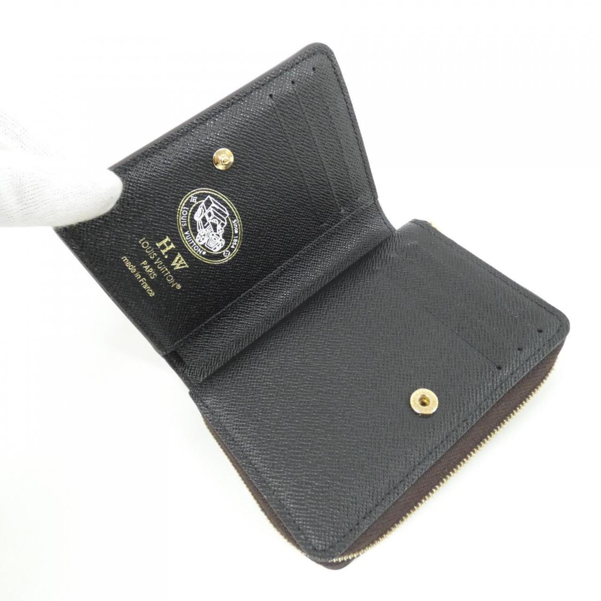 Louis Vuitton Brown Coated Canvas Wallet (Bi-Fold) (Pre-Owned)