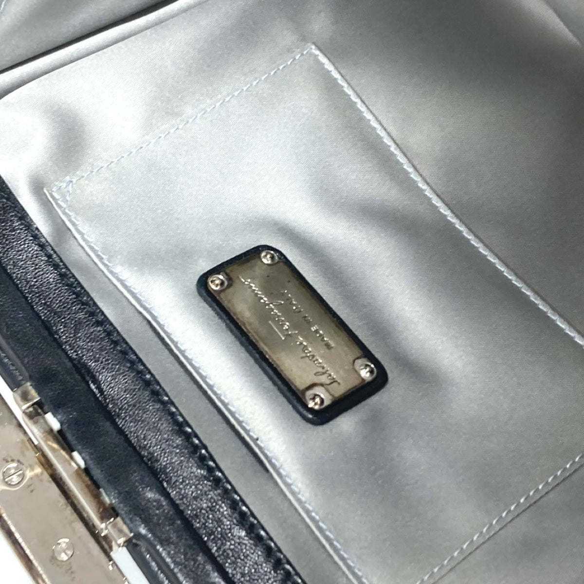 Salvatore Ferragamo Gancini Black Leather Clutch Bag (Pre-Owned)