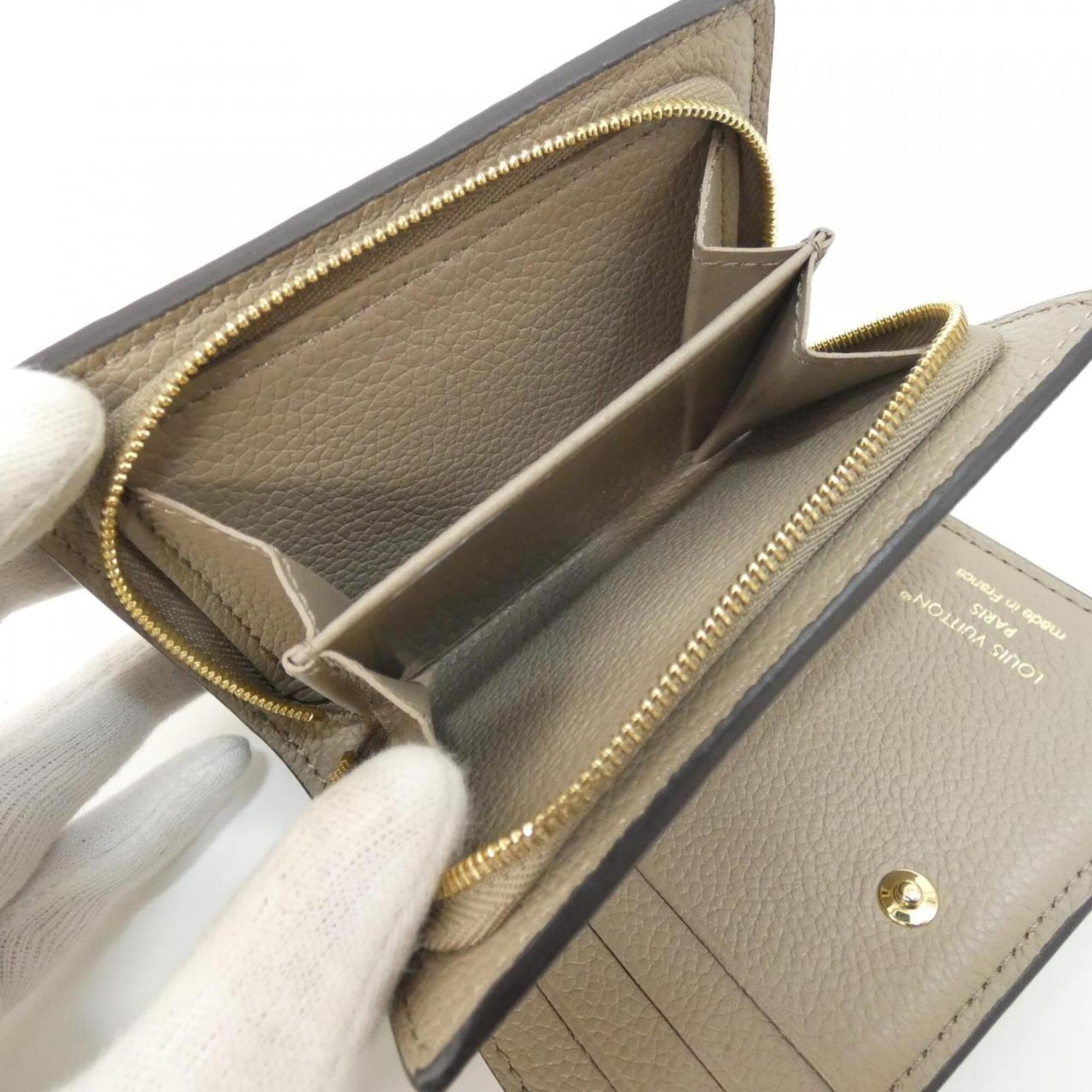 Louis Vuitton Monogram Empreinte Tourterelle Leather Wallet (Bi-Fold) (Pre-Owned)