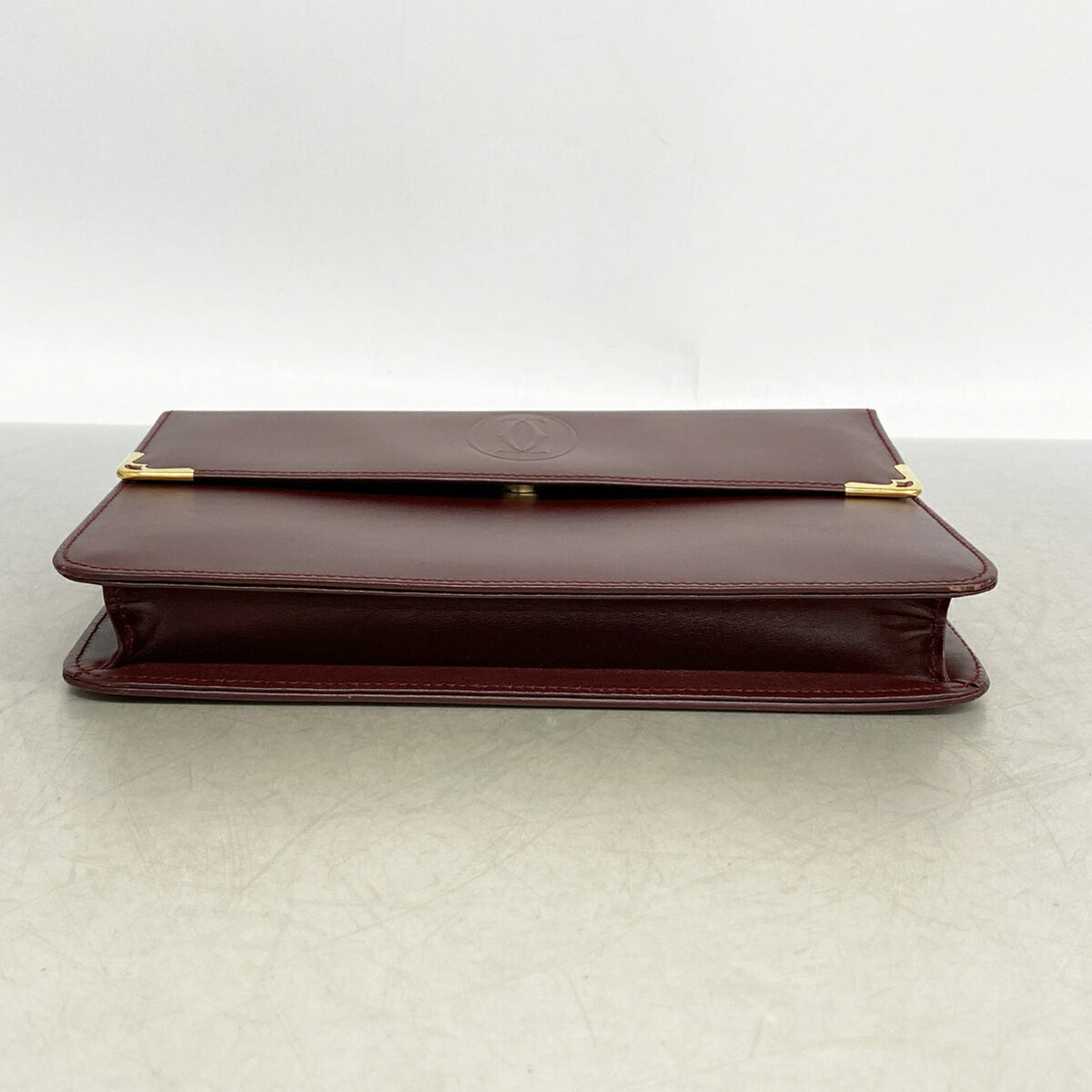 Cartier Bordeaux Leather Clutch Bag (Pre-Owned)