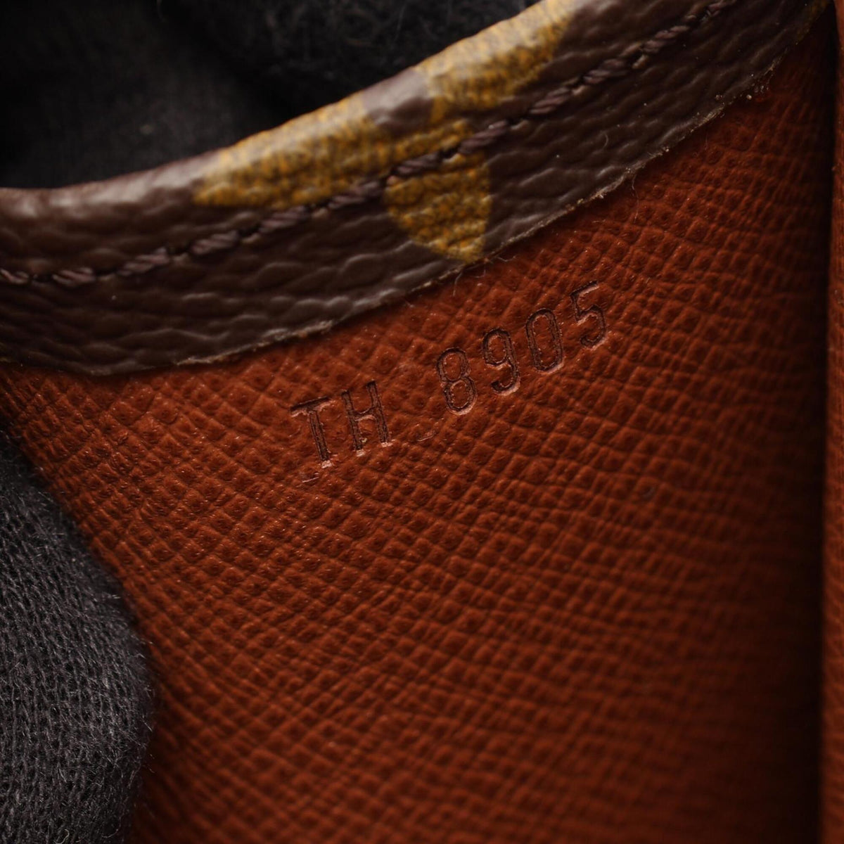 Louis Vuitton Brown Coated Canvas Clutch Bag Handbag (Pre-Owned)