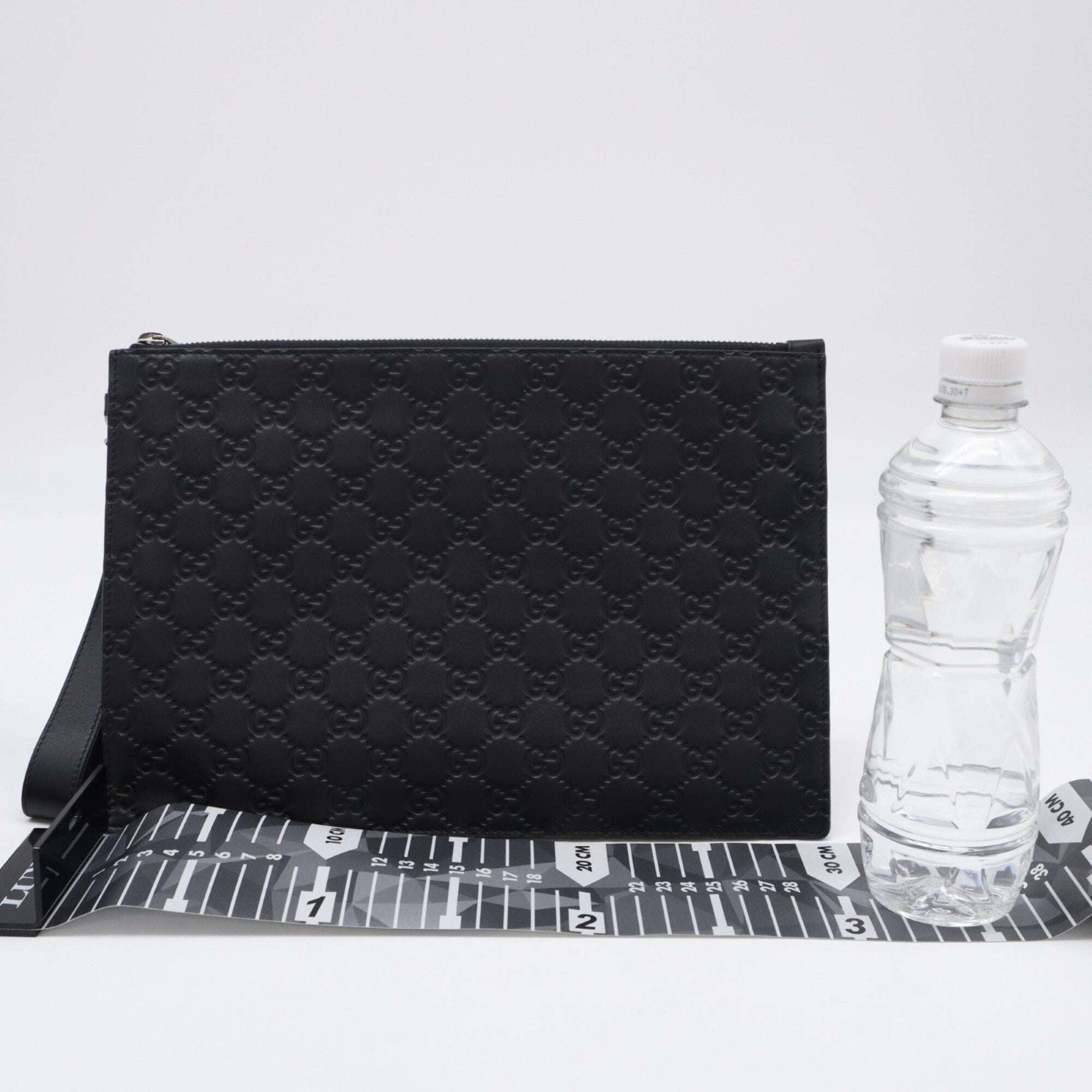 Gucci Guccissima Black Leather Clutch Bag (Pre-Owned)