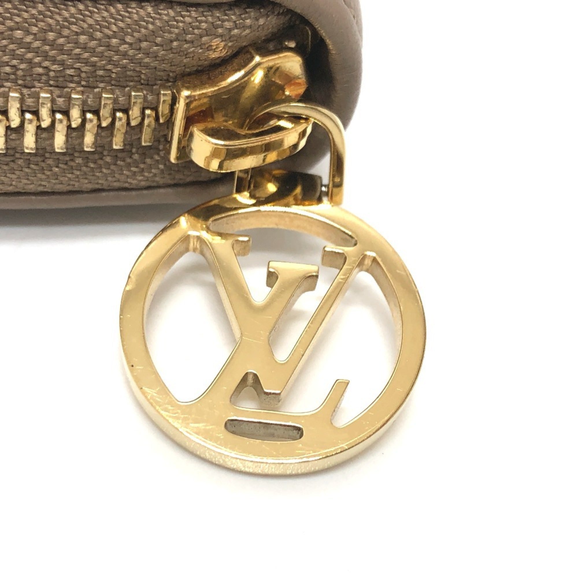 Louis Vuitton Beige Leather Long Wallet (Bi-Fold) (Pre-Owned)