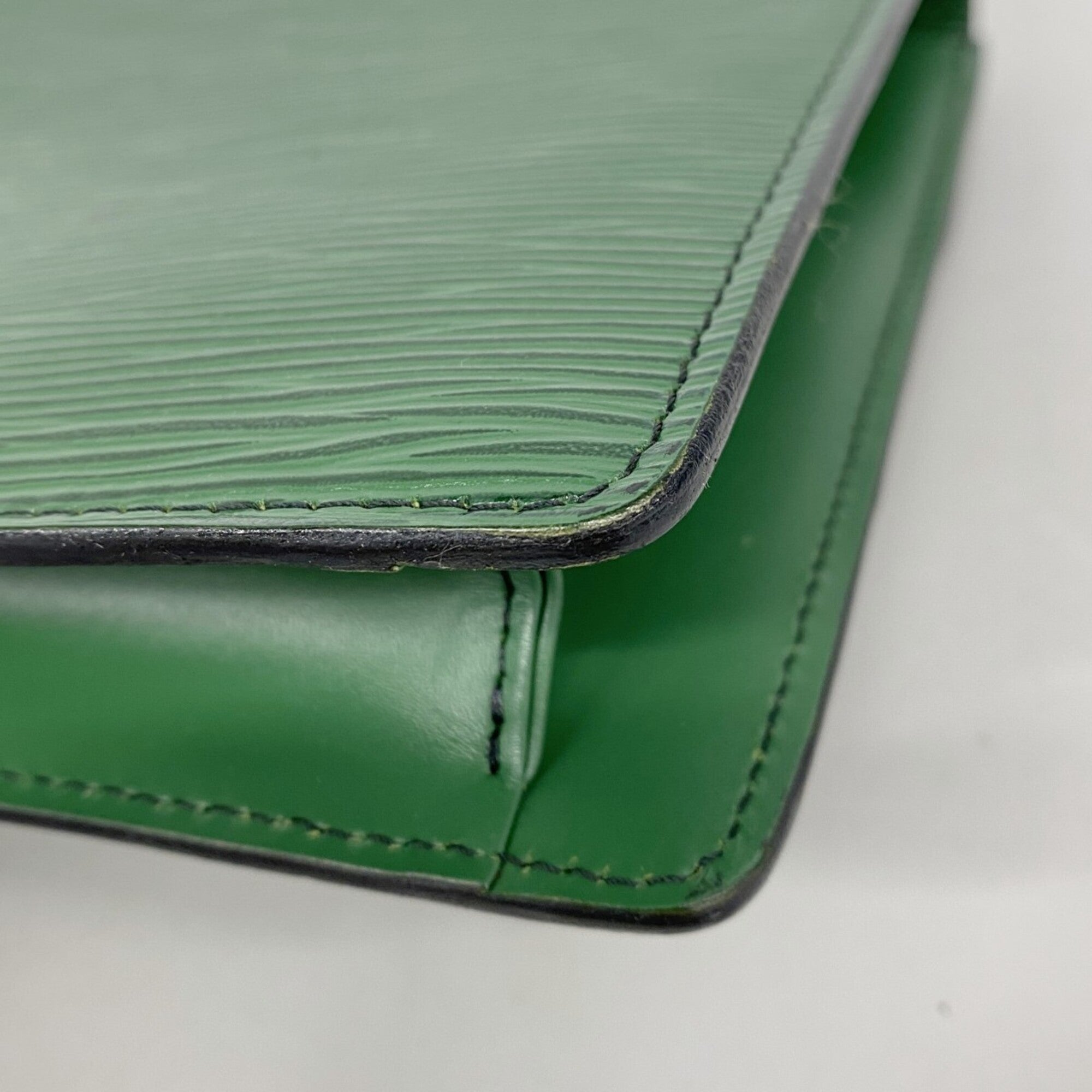 Louis Vuitton Borneo Green Clutch Bag (Pre-Owned)