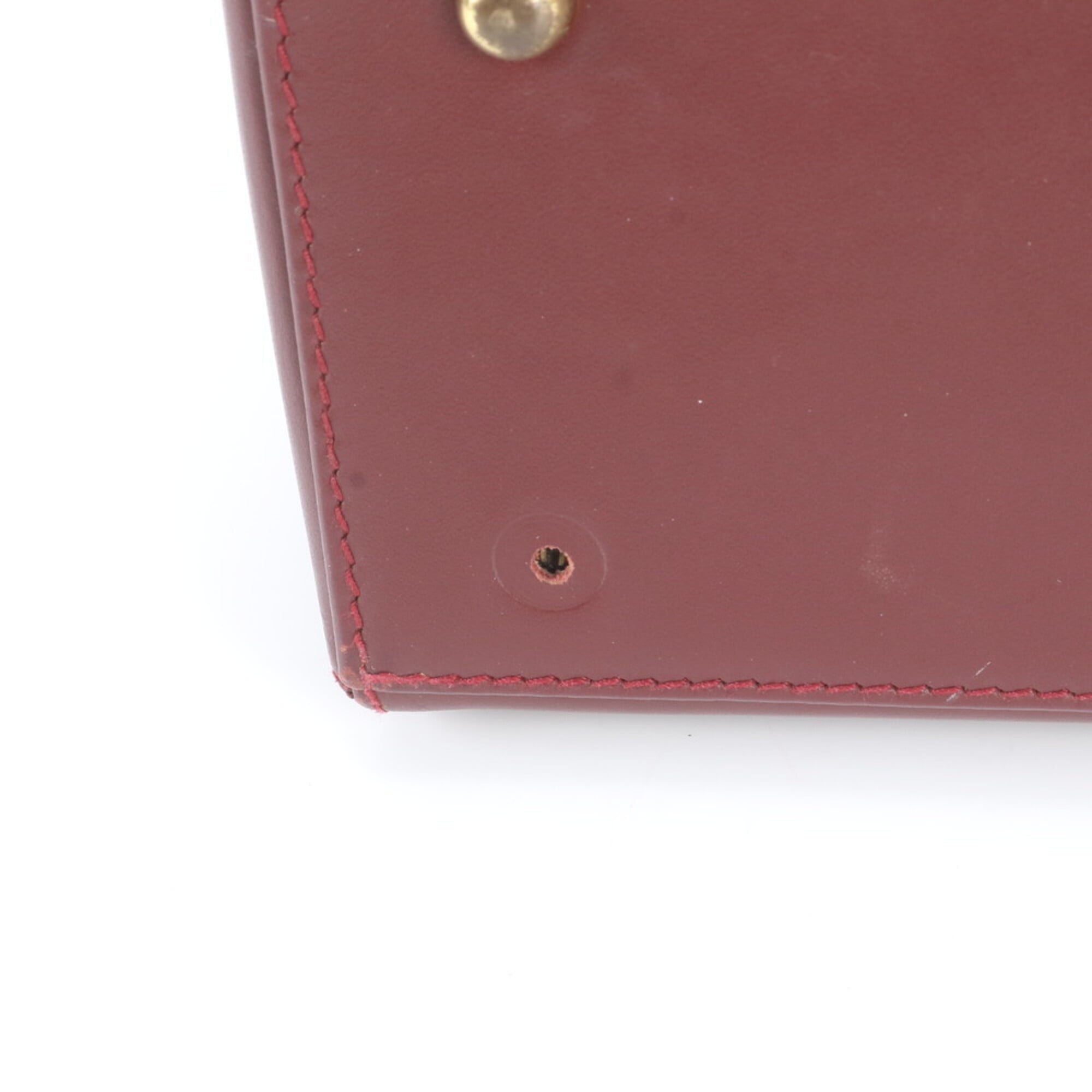 Cartier Wine Red Leather Handbag (Pre-Owned)