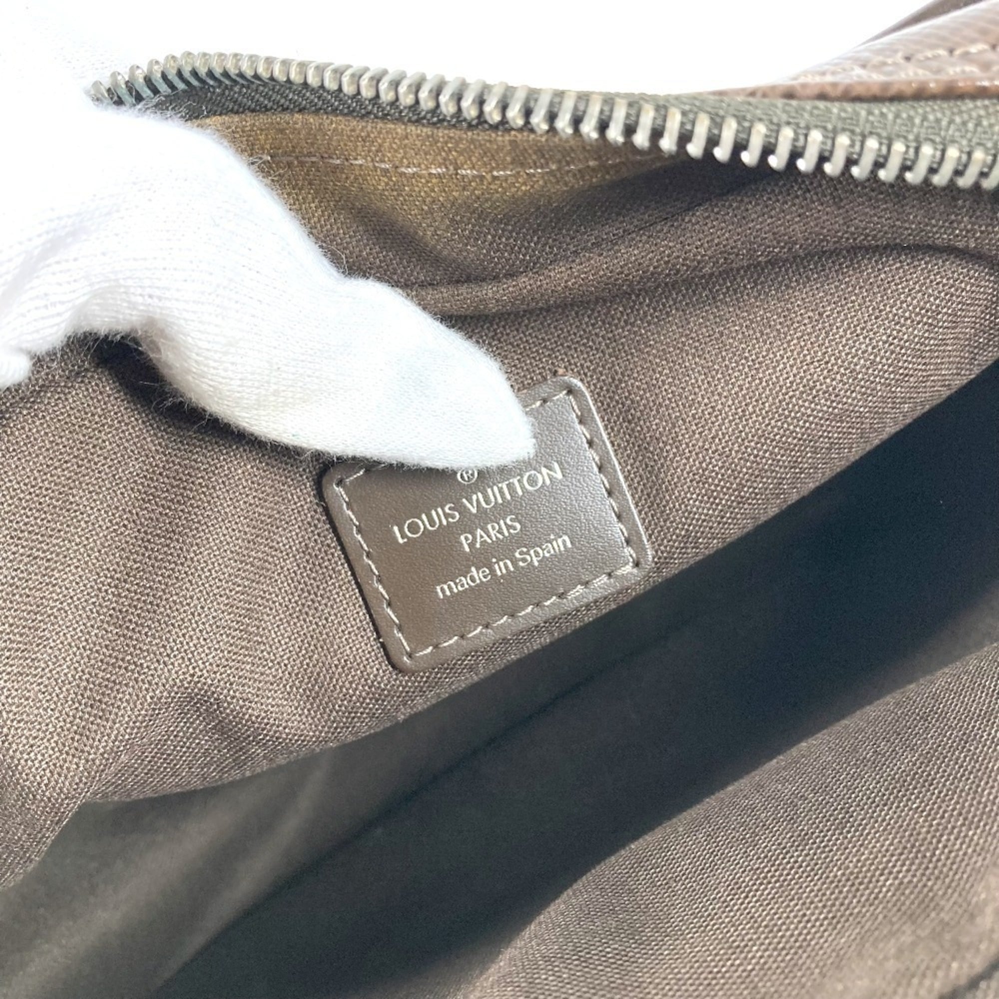 Louis Vuitton Brown Grizzly Taiga Leather Leather Clutch Bag (Pre-Owned)