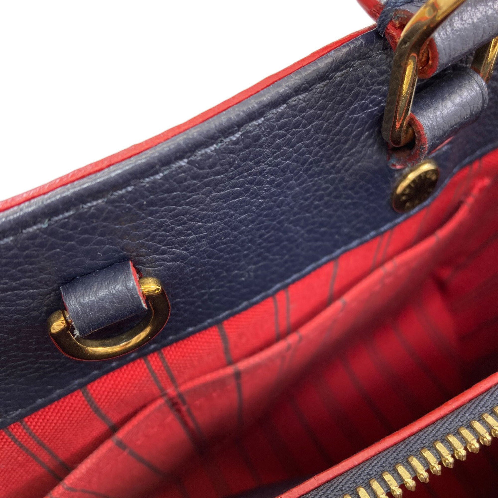 Louis Vuitton Marine Rouge Monogram Empreinte Handbag (Pre-Owned)