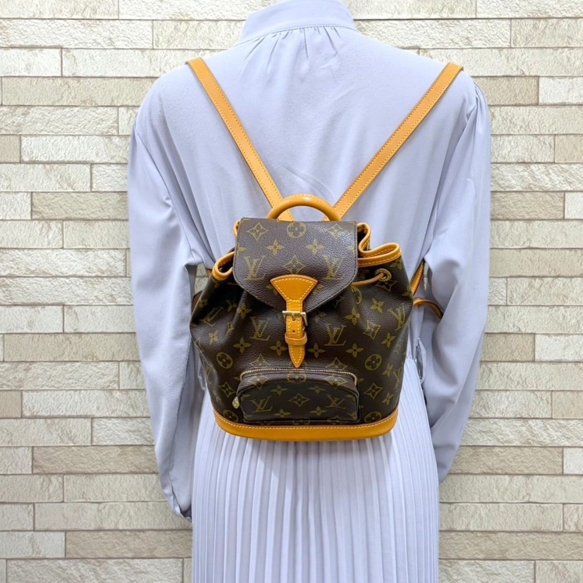 Louis Vuitton Brown Monogram Canvas Backpack (Pre-Owned)