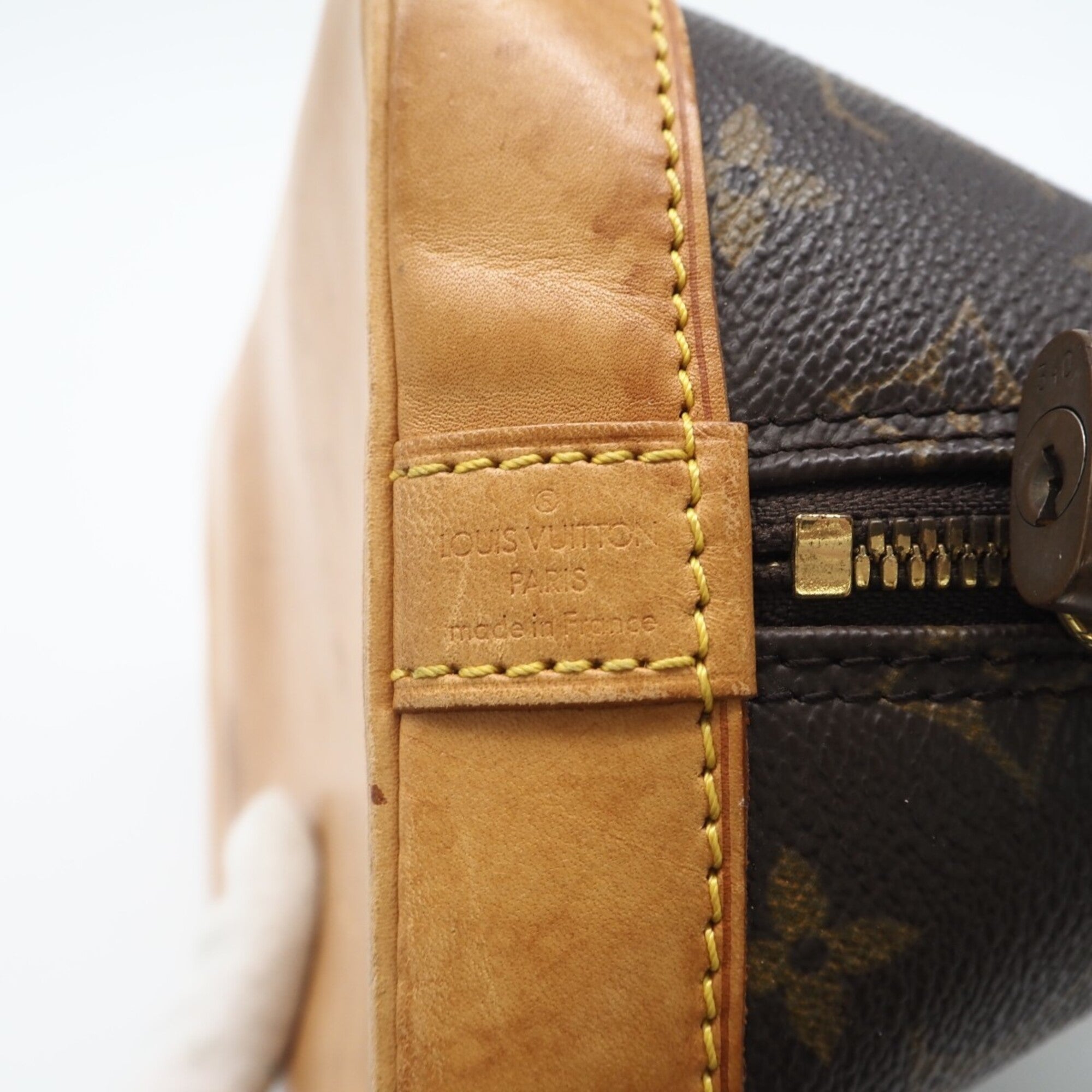 Louis Vuitton Brown Coated Canvas Leather Handbag (Pre-Owned)