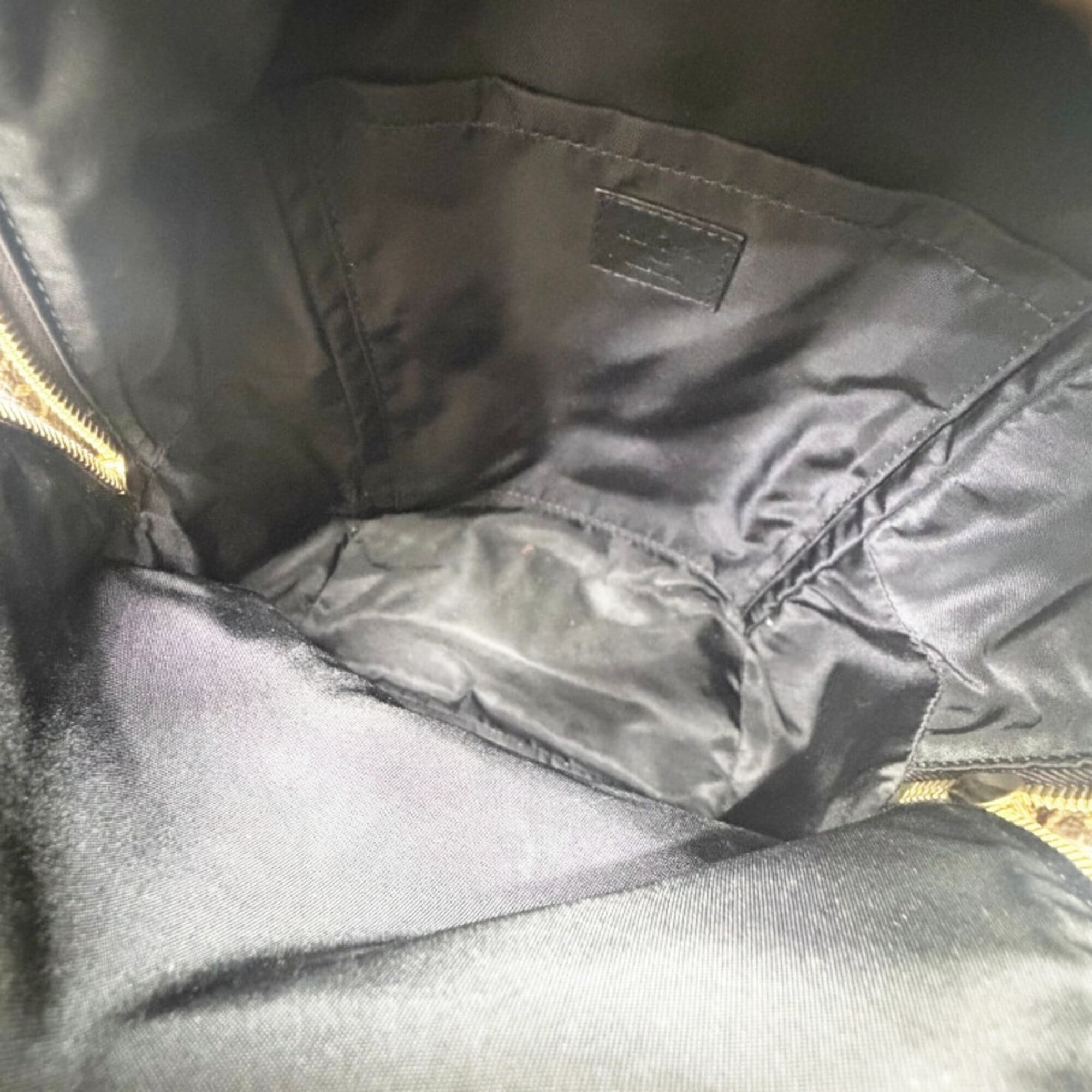 Louis Vuitton Black Brown Monogram Leather Backpack (Pre-Owned)