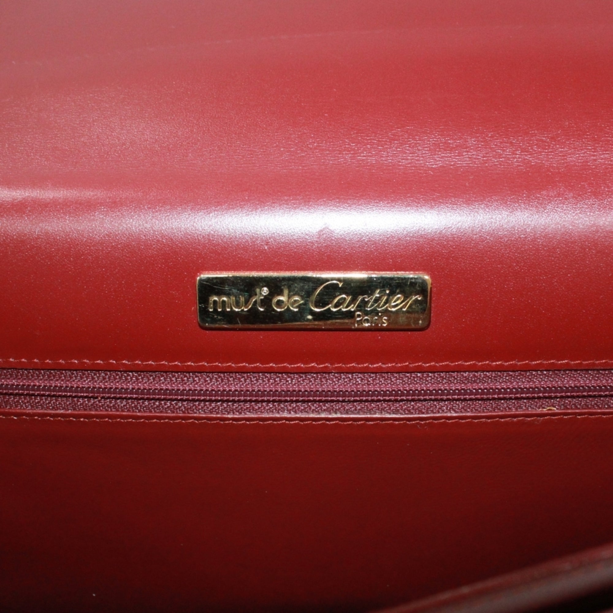 Cartier Bordeaux Leather Clutch Bag (Pre-Owned)