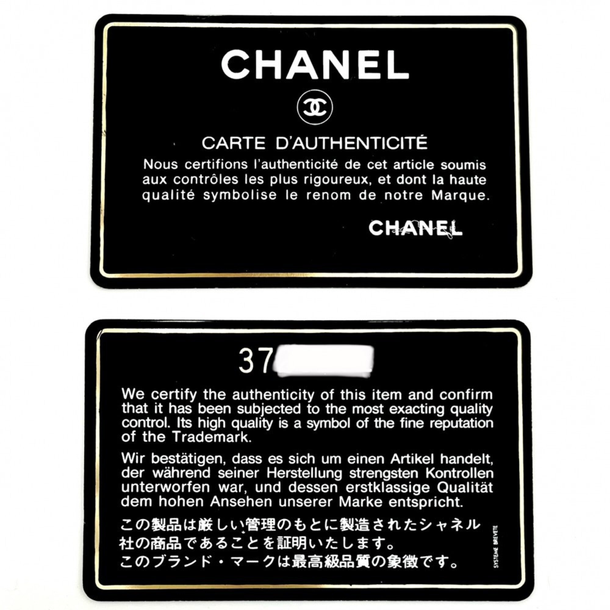 Chanel Black Grained Calfskin Handbag (Pre-Owned)