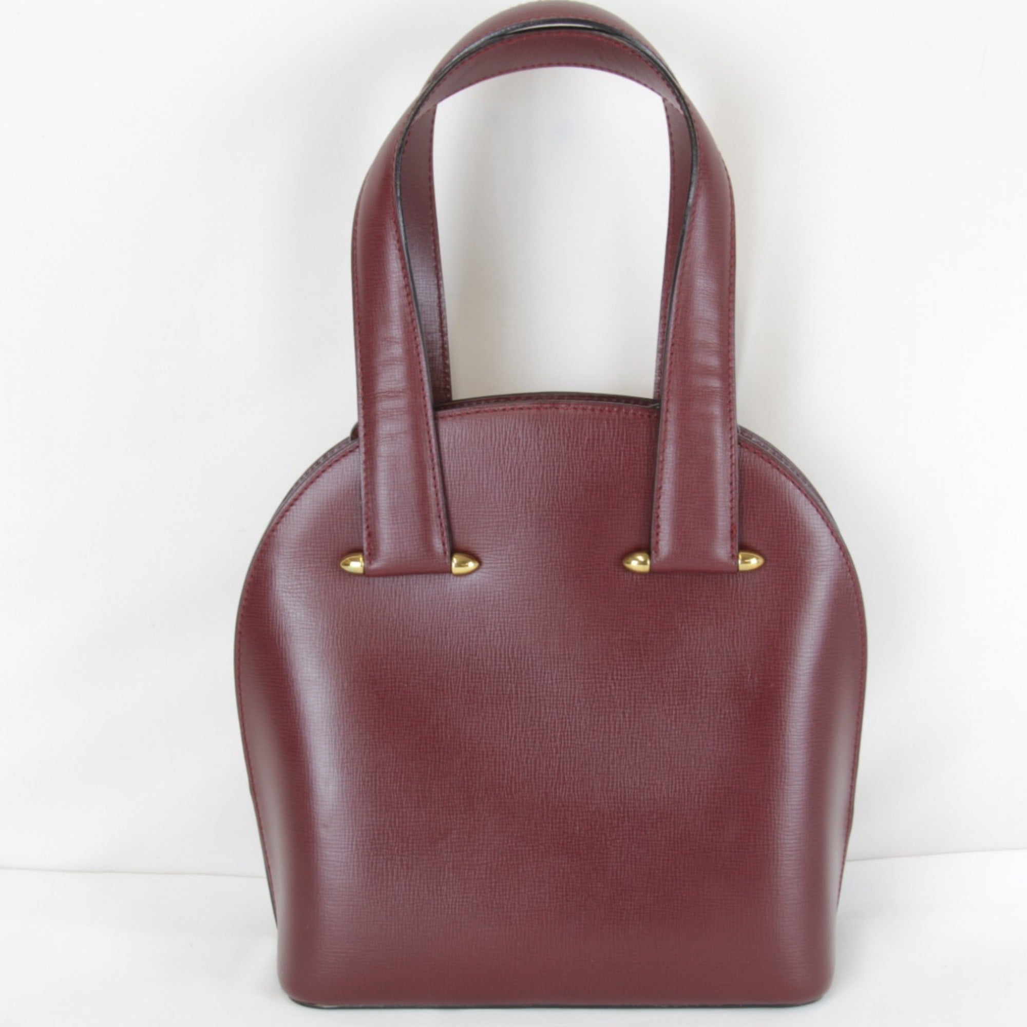 Cartier Must Wine Red Leather Handbag (Pre-Owned)