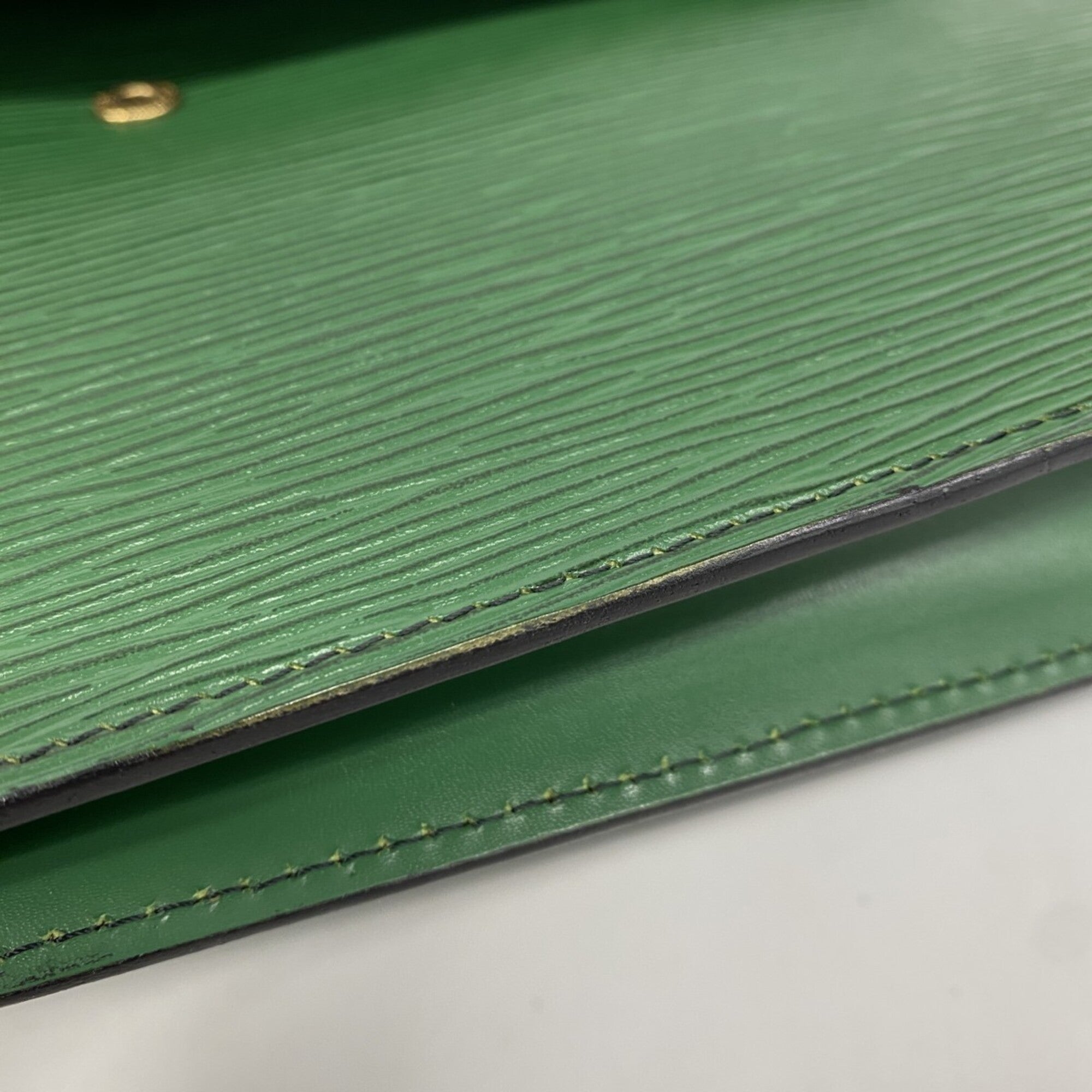 Louis Vuitton Borneo Green Clutch Bag (Pre-Owned)