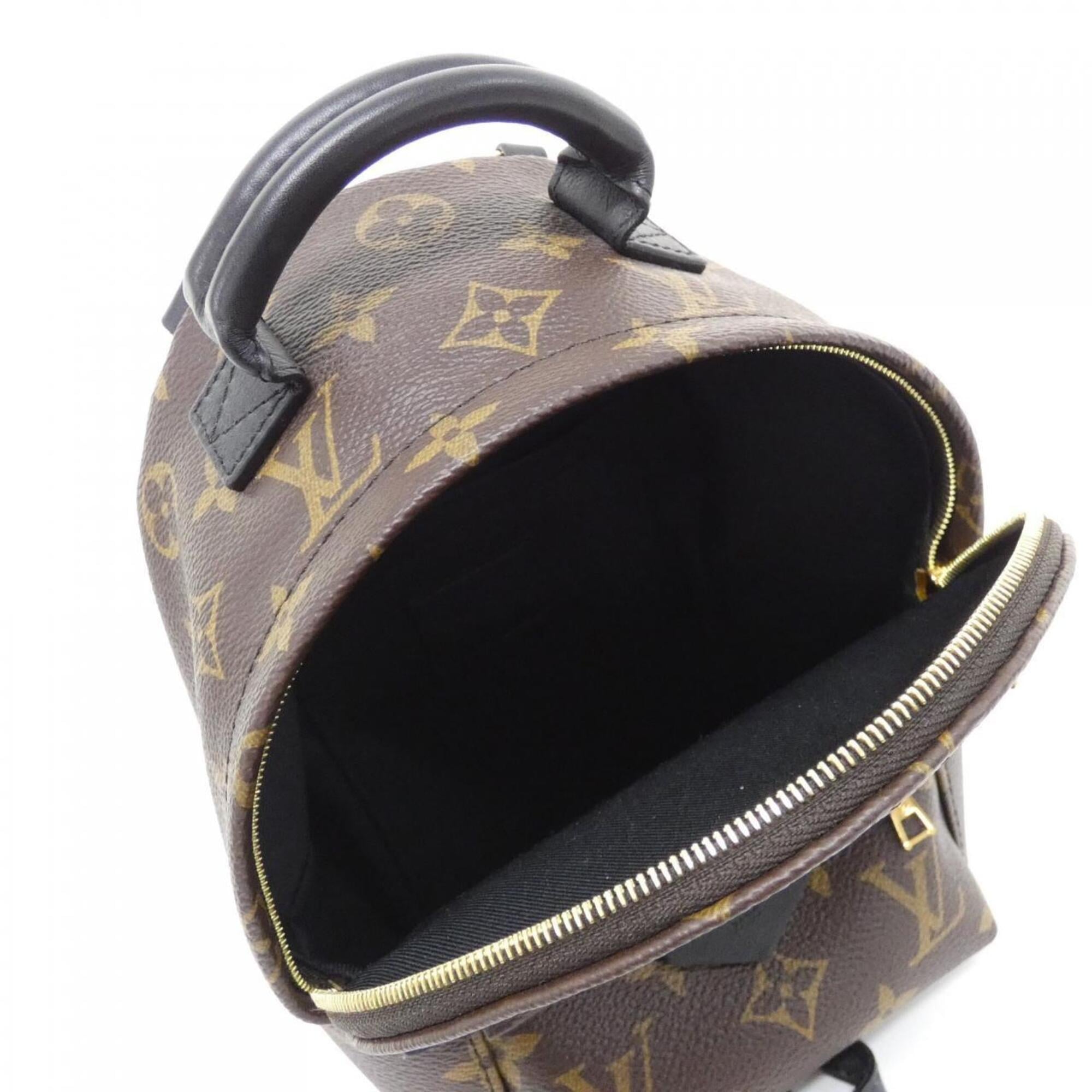 Louis Vuitton Brown Coated Canvas Backpack (Pre-Owned)