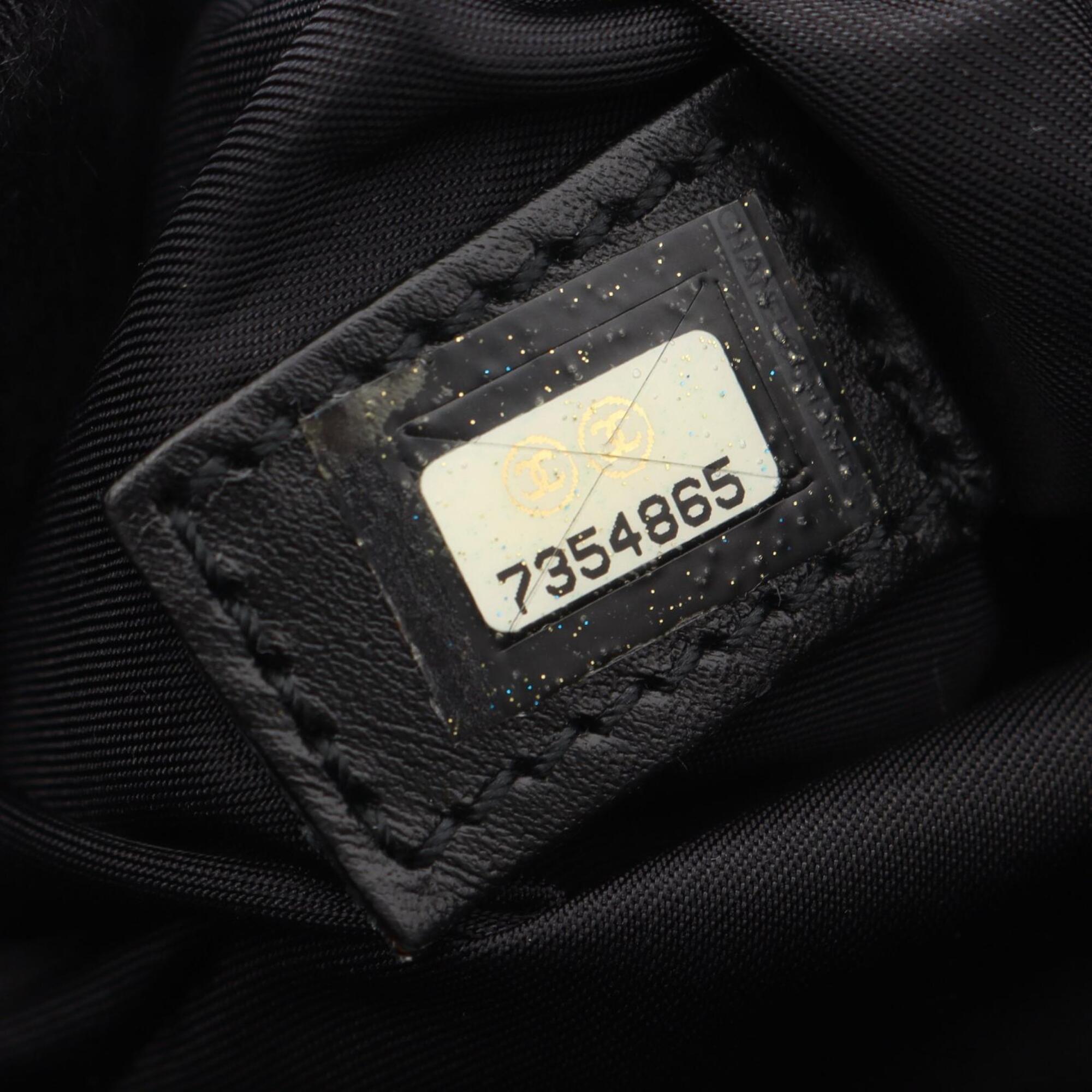 Chanel Black Leather Nylon Canvas Handbag (Pre-Owned)
