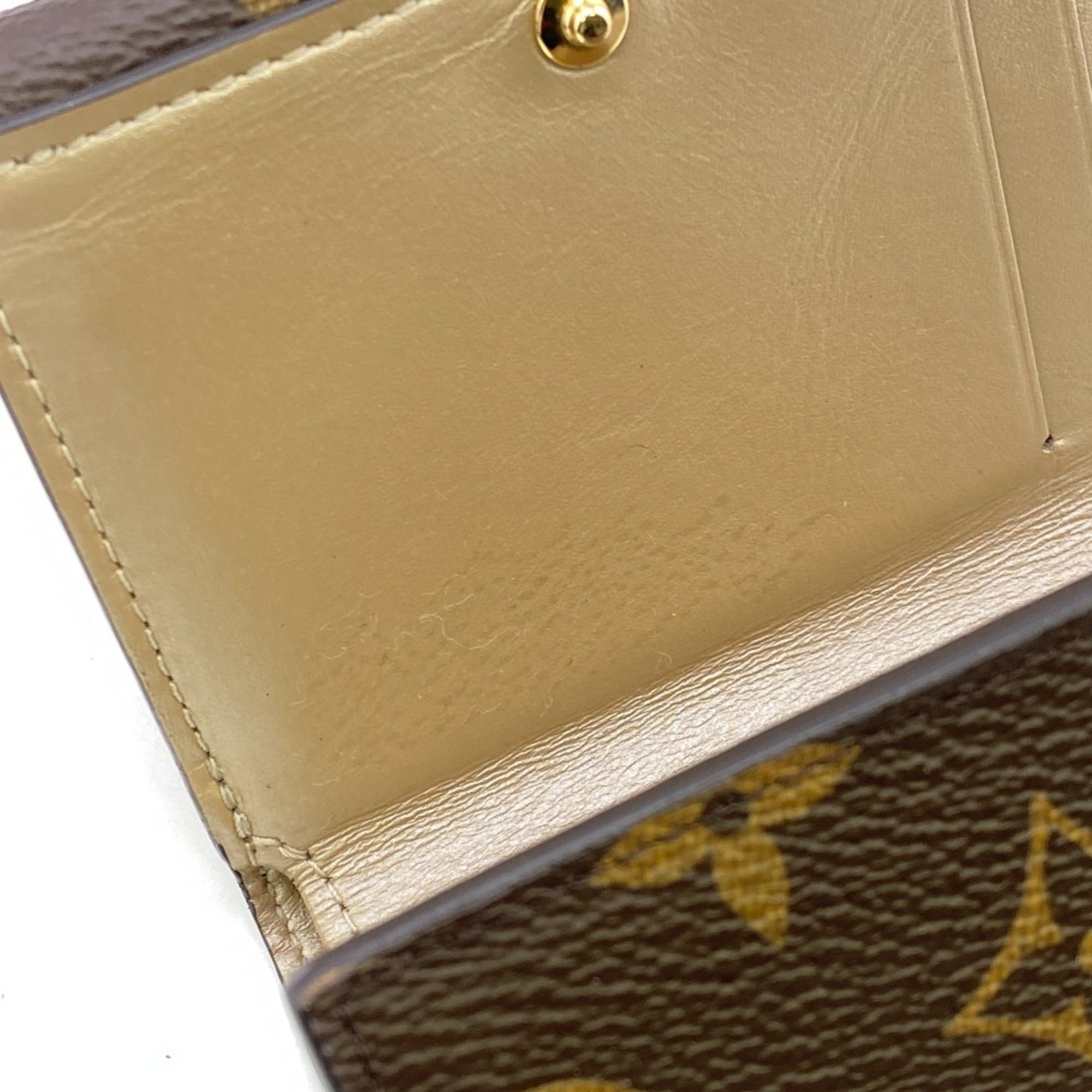Louis Vuitton Brown Leather Wallet (Tri-Fold) (Pre-Owned)