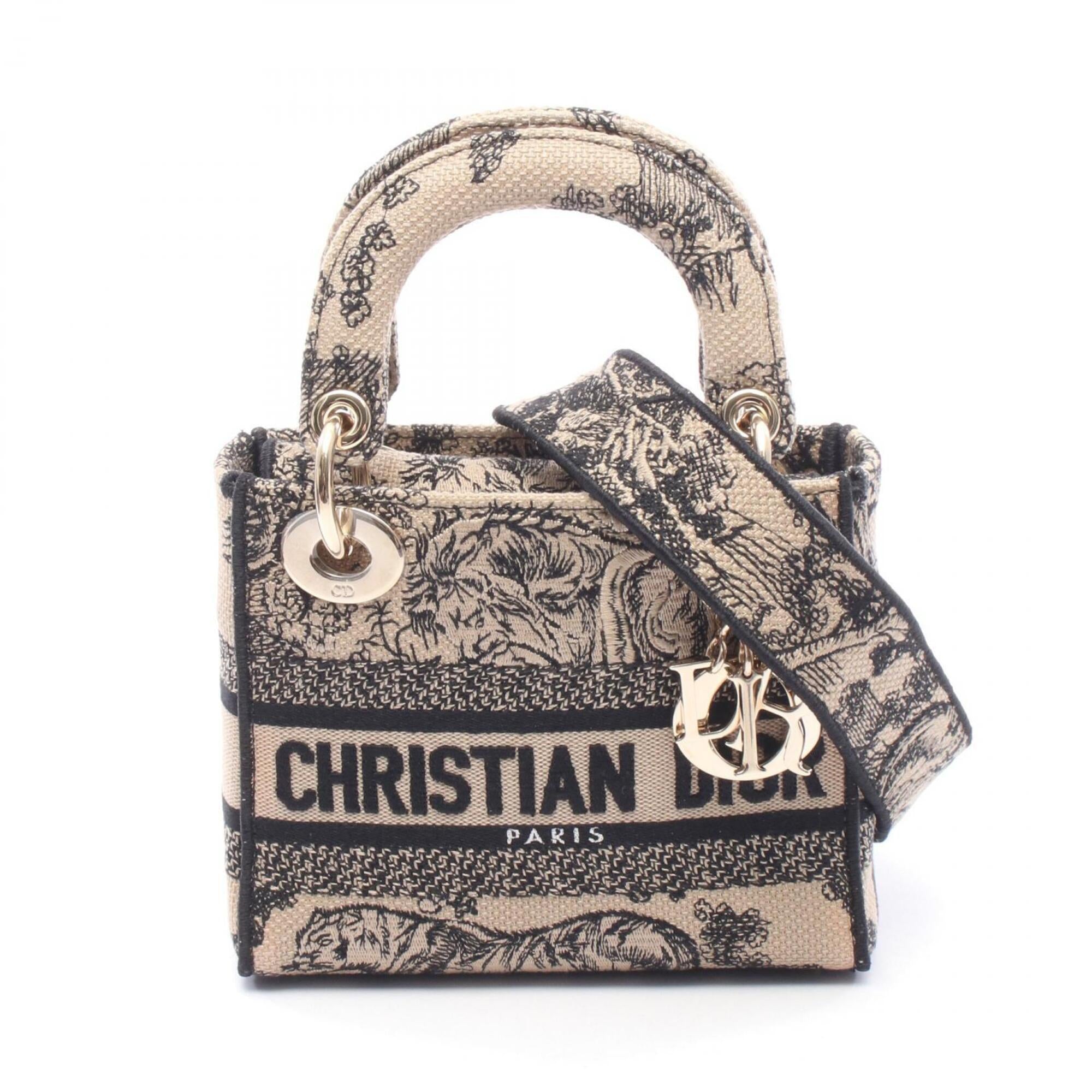Christian Dior Beige Black Canvas Handbag (Pre-Owned)